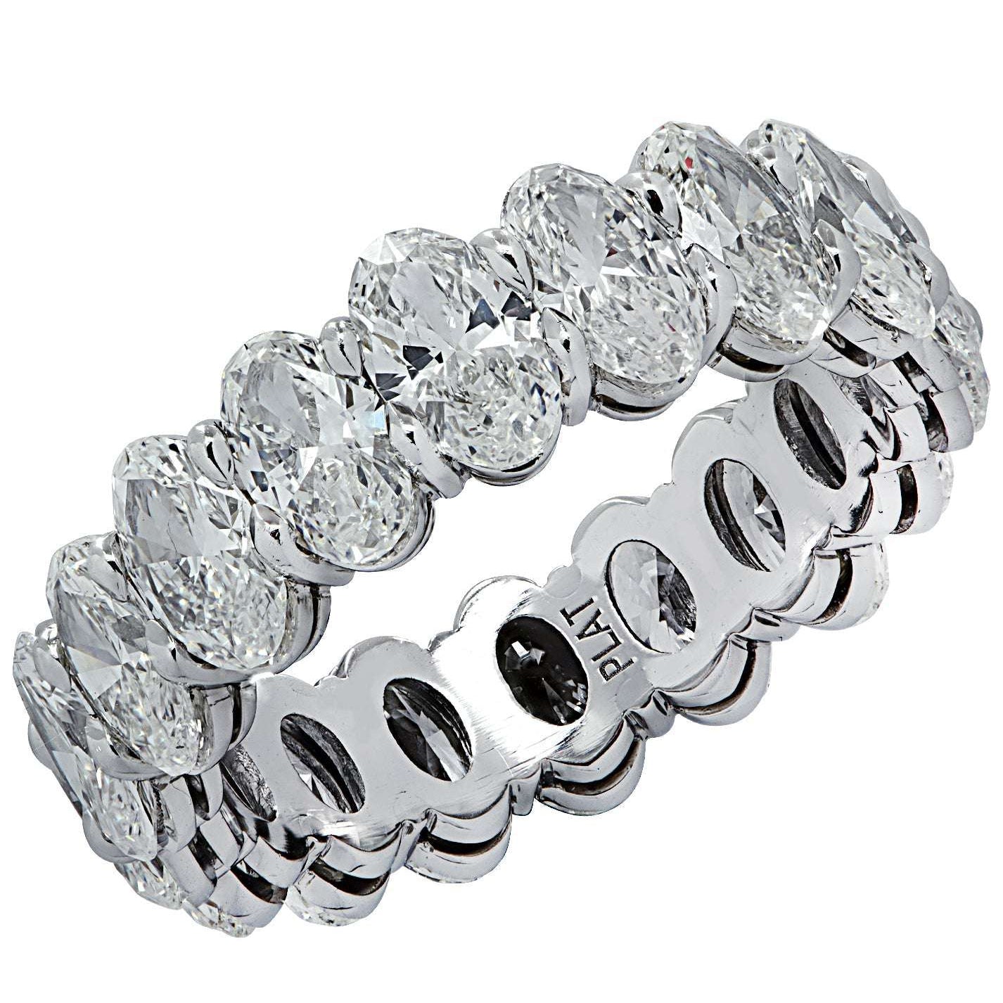 Vivid Diamonds 4.96 Carat Oval Diamond Eternity Band in Platinum featuring emerald cut diamonds, showcasing luxury and elegance.