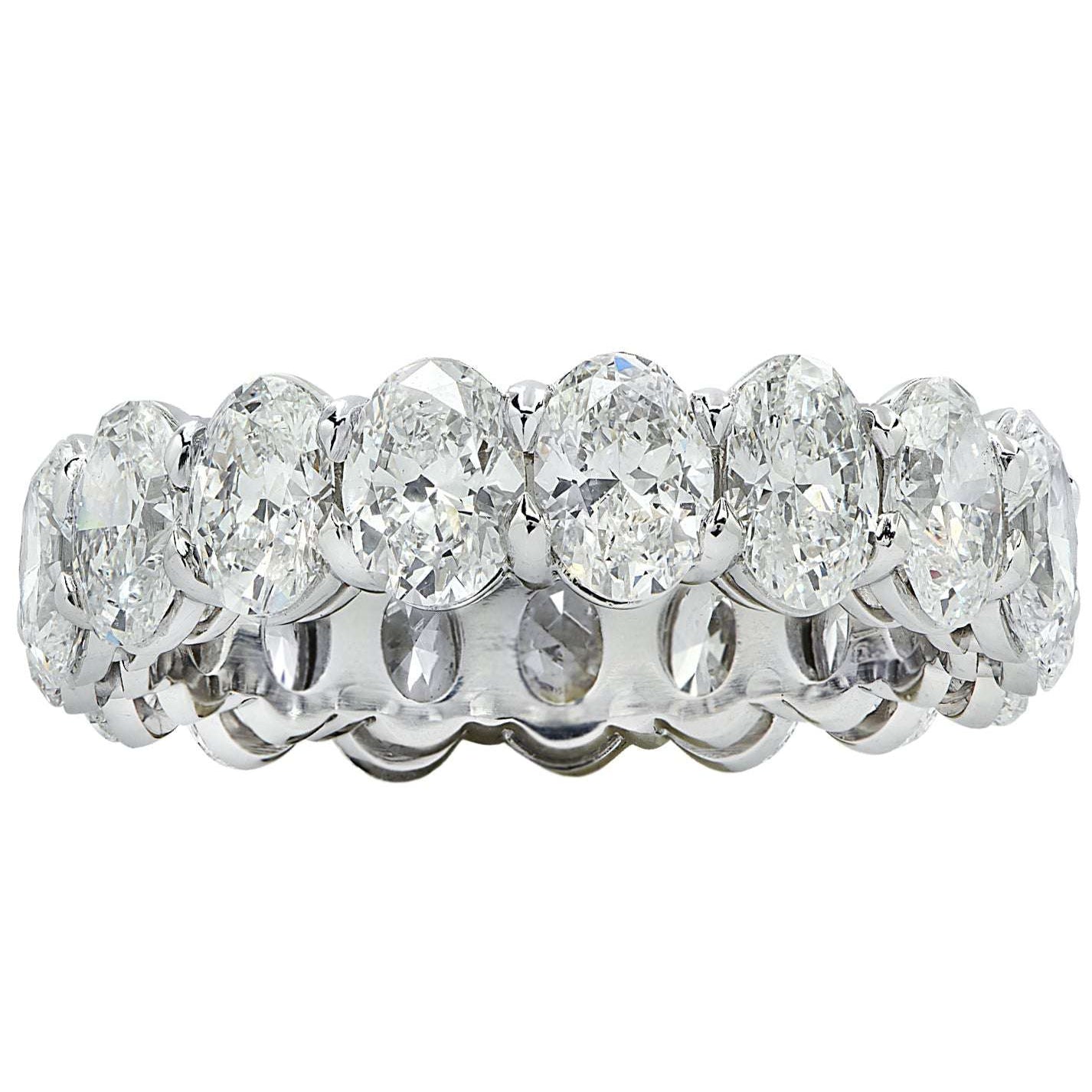 Vivid Diamonds GIA Certified 5.35 Carat Oval Diamond Eternity Band in Platinum showcasing a dazzling array of oval diamonds, reflecting brilliance and luxury.