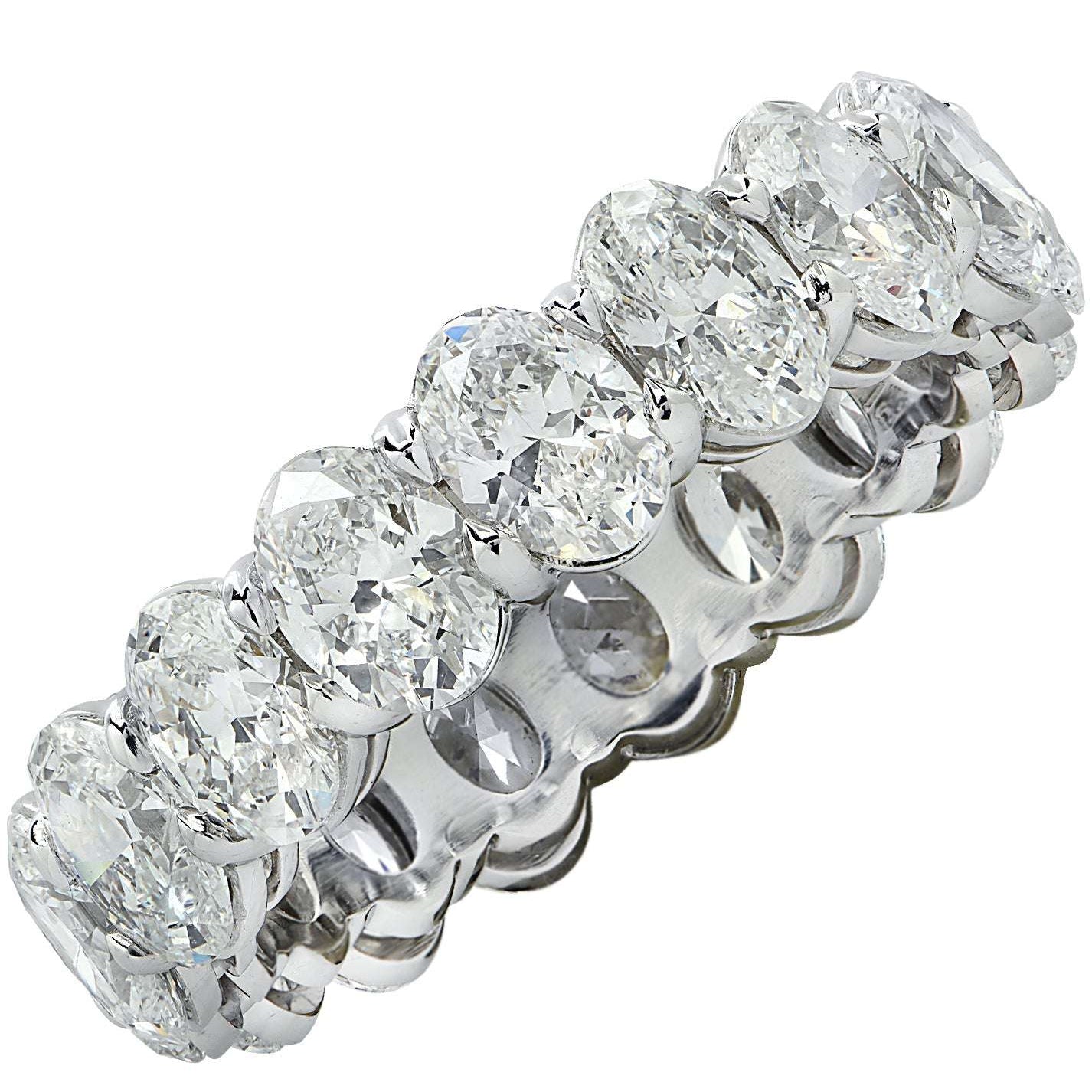 Luxury Vivid Diamonds GIA Certified 5.35 Carat Oval Diamond Eternity Band in Platinum showcasing exquisite craftsmanship and shimmering brilliance of oval diamonds, perfect for special occasions.