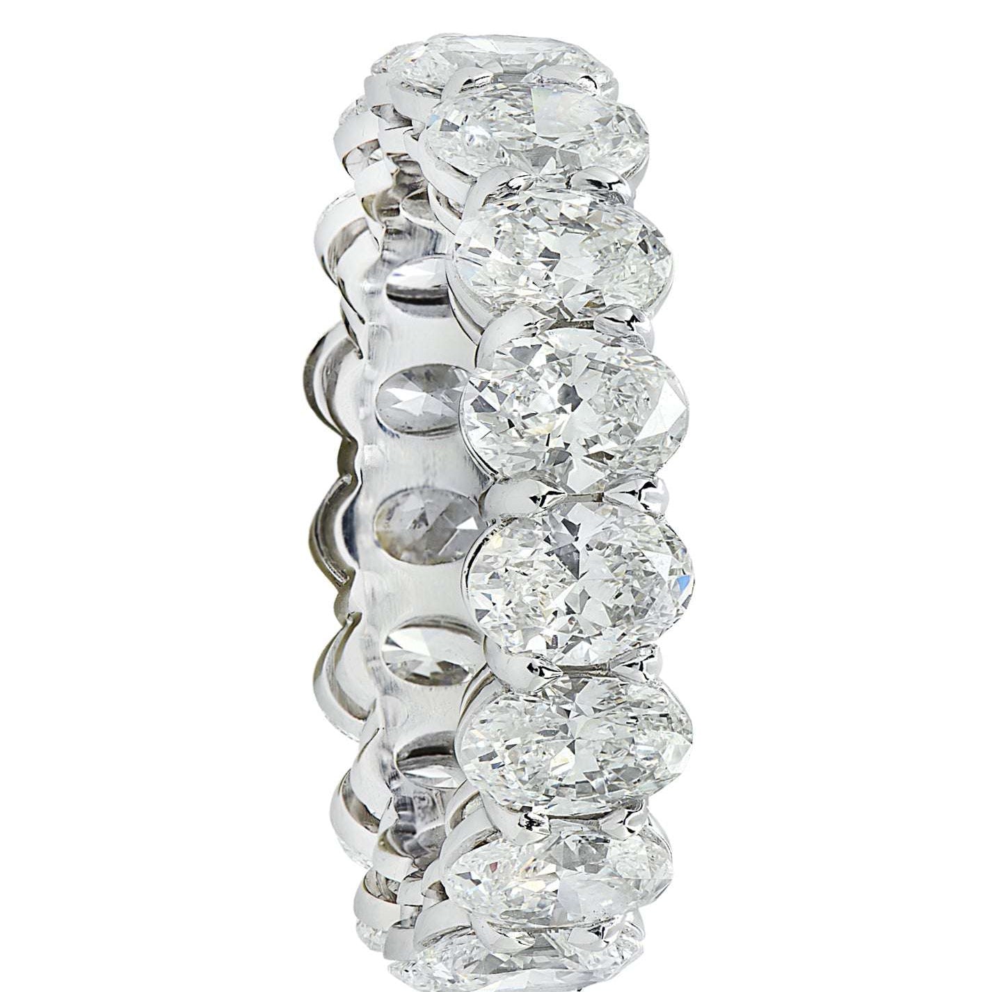 Profile view of the Vivid Diamonds GIA Certified 5.35 Carat Oval Diamond Eternity Band in Platinum, featuring exquisite craftsmanship and a seamless design filled with sparkling oval diamonds.
