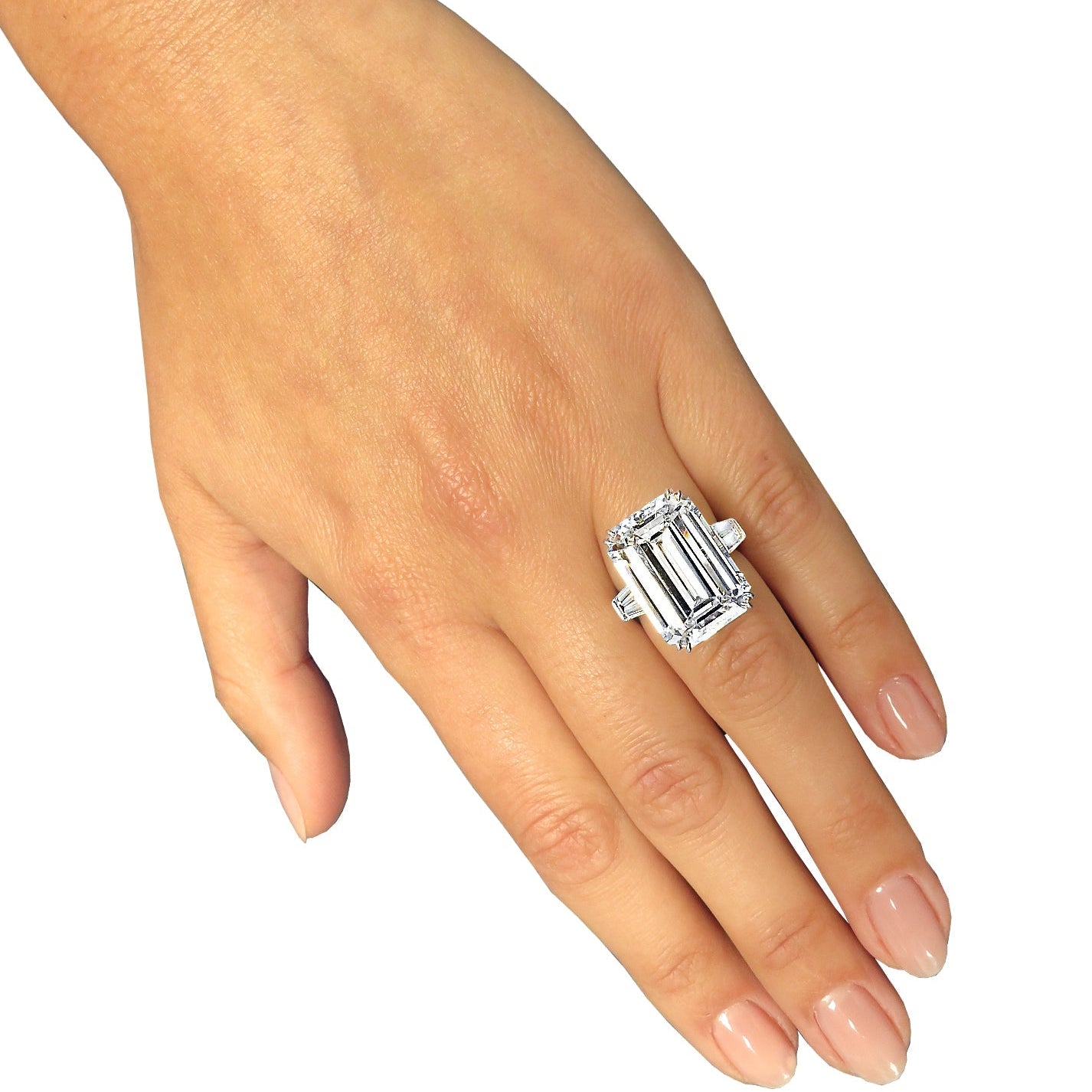 Elegant 18.66ct GIA Certified Emerald Cut Diamond Engagement Ring in Platinum with Baguette Side Stones by Vivid Diamonds, displayed on a hand, illustrating the grandeur and timeless beauty of this piece.