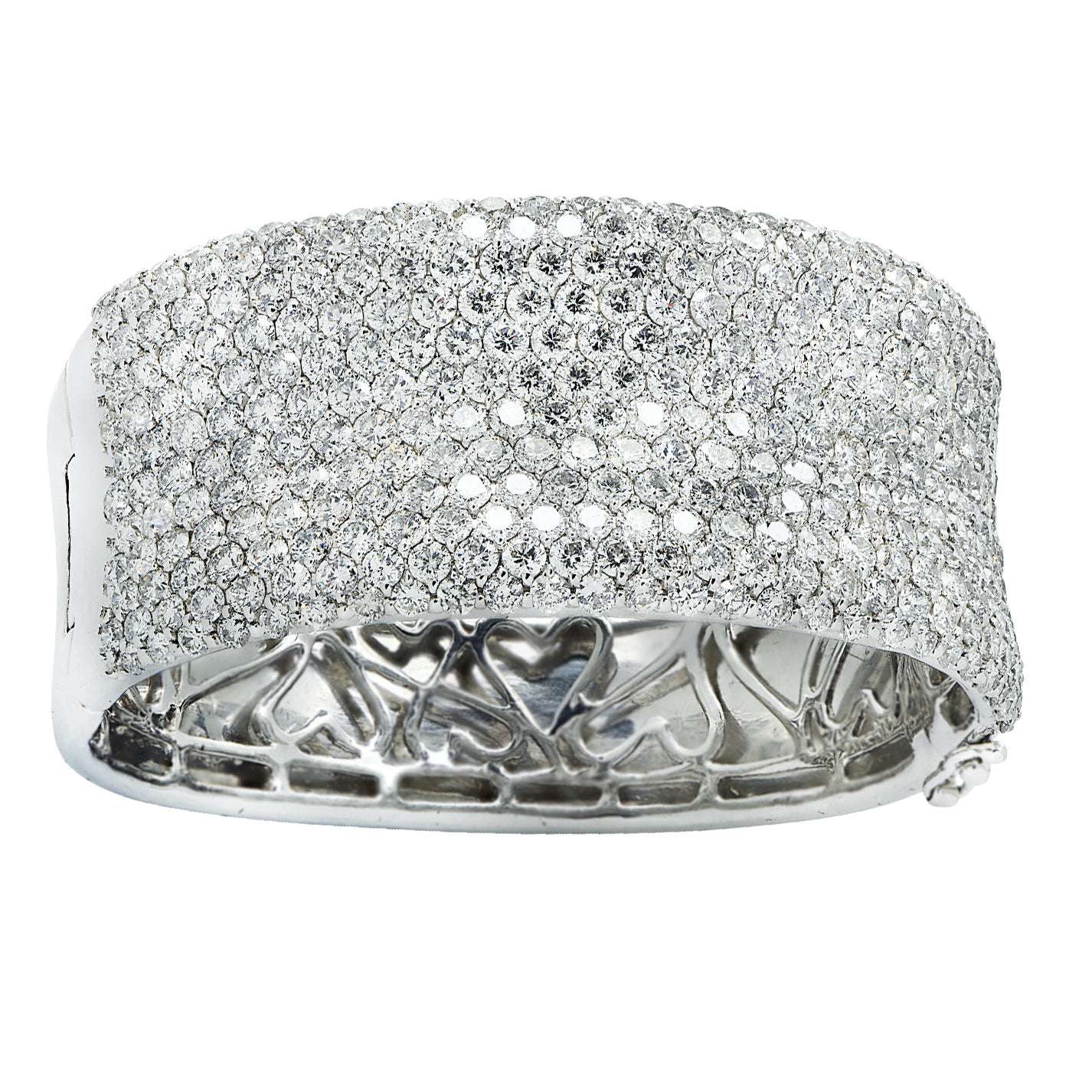 Vivid Diamonds 27.72 Carat Diamond Bangle displaying a seamless wave of brilliance with carefully set diamonds, a perfect example of luxury jewelry.