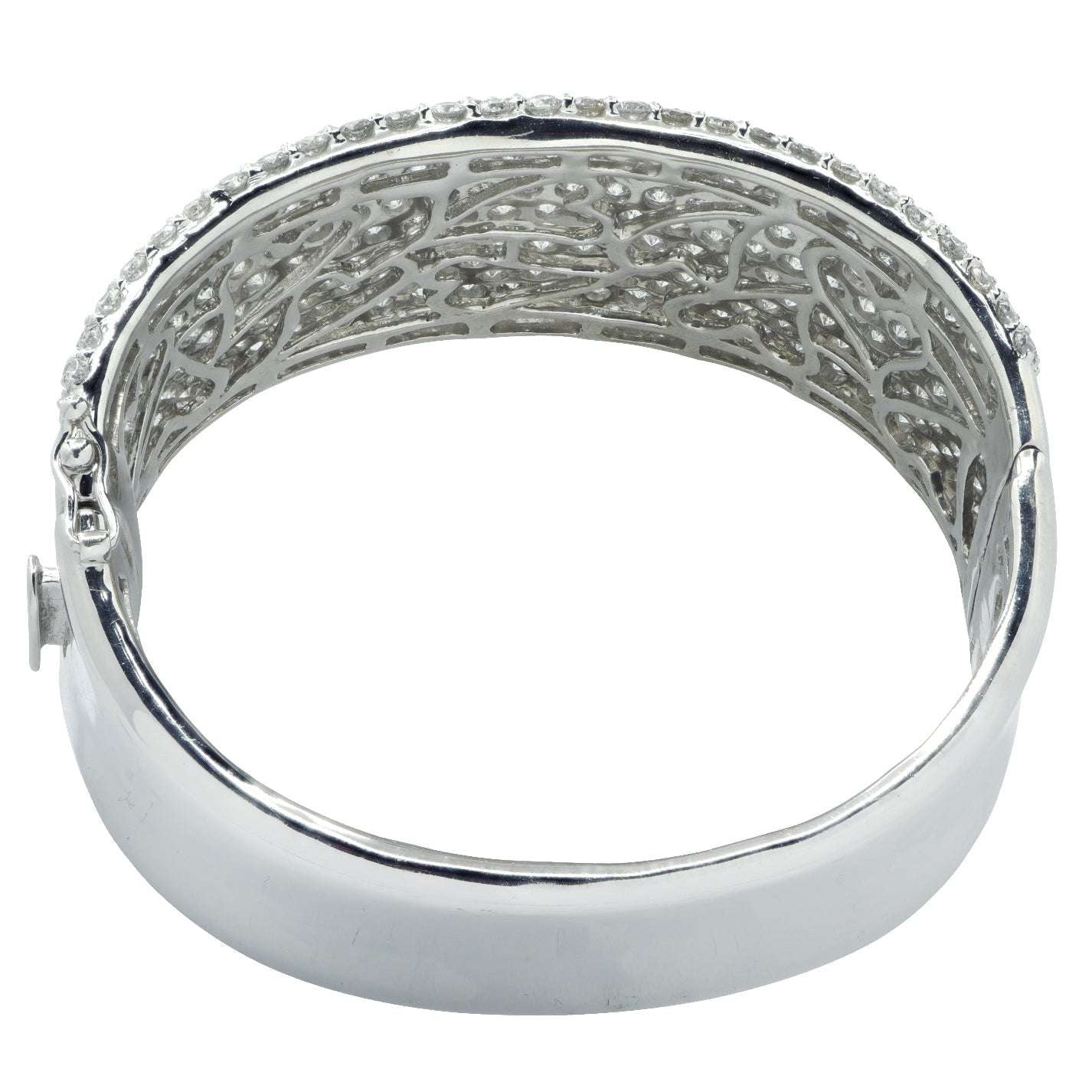 Interior view of Vivid Diamonds 27.72 Carat Diamond Bangle revealing intricate design features and secure hidden clasp, exemplifying fine jewelry craftsmanship.