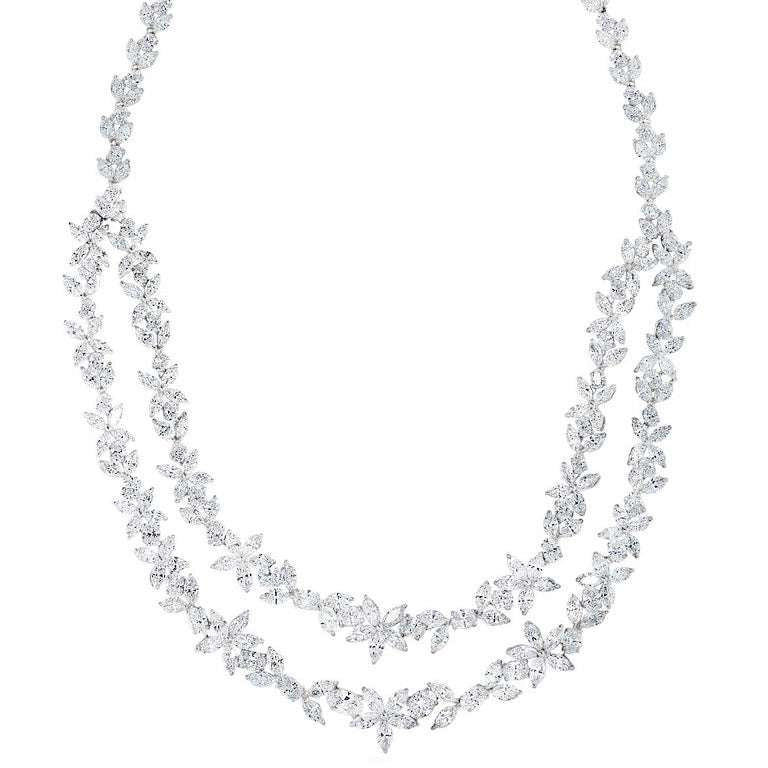 Elegant 40 Carat Vivid Diamonds Cluster Necklace in 18K White Gold by Vivid Diamonds, featuring a luxurious arrangement of radiant diamonds in oval and marquise shapes.