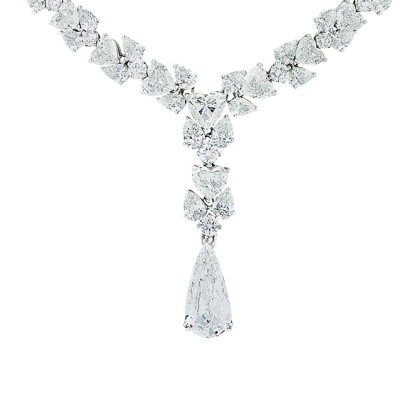 Stunning Vivid Diamonds 56 Carat Platinum Diamond Drop Necklace featuring a dazzling pear-shaped diamond centerpiece and intricate diamond arrangement, epitomizing luxury.