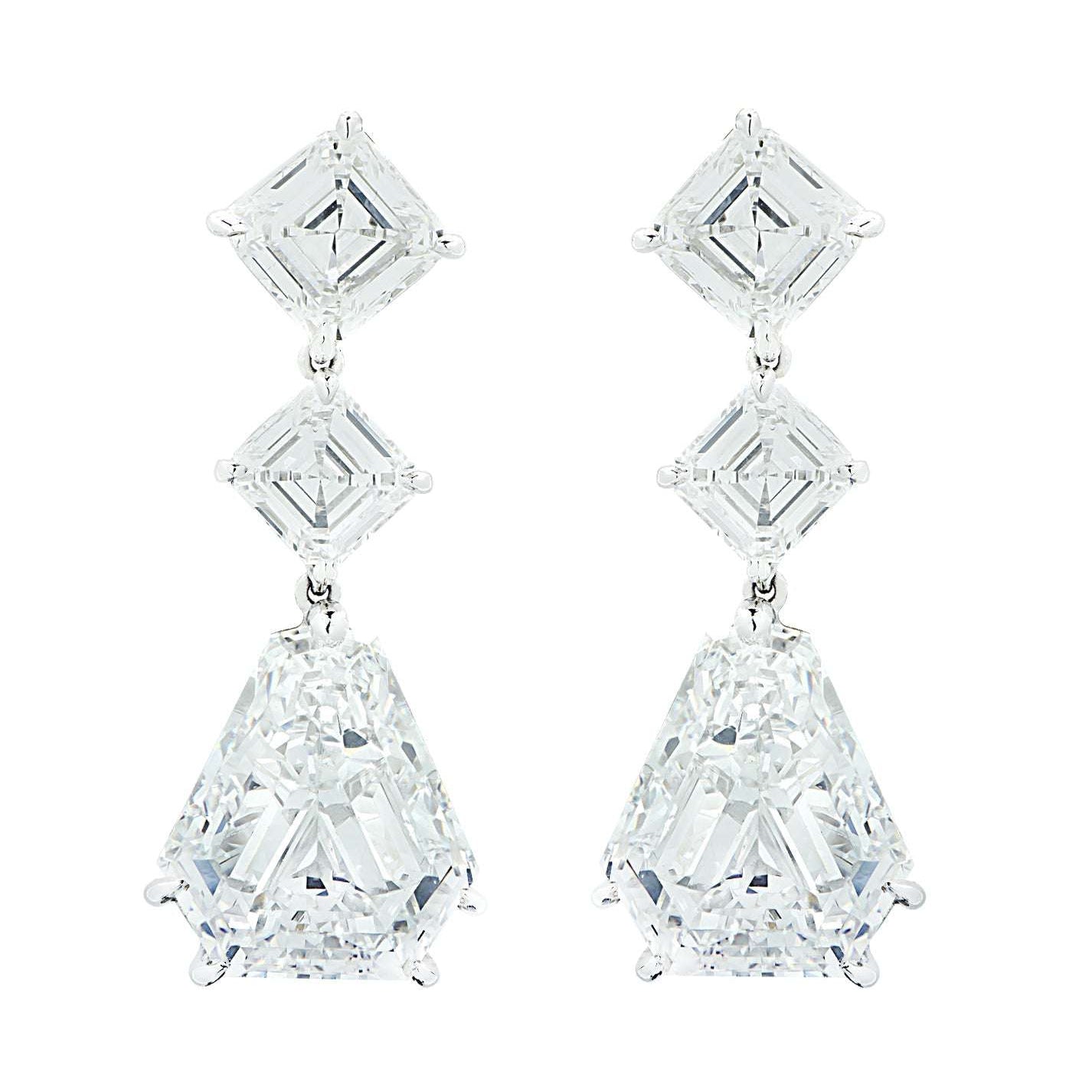 Elegant Bvlgari 13.97CT Diamond Dangle Earrings in Platinum by Vivid Diamonds, highlighting luxurious GIA-certified diamonds with a captivating dangle design.