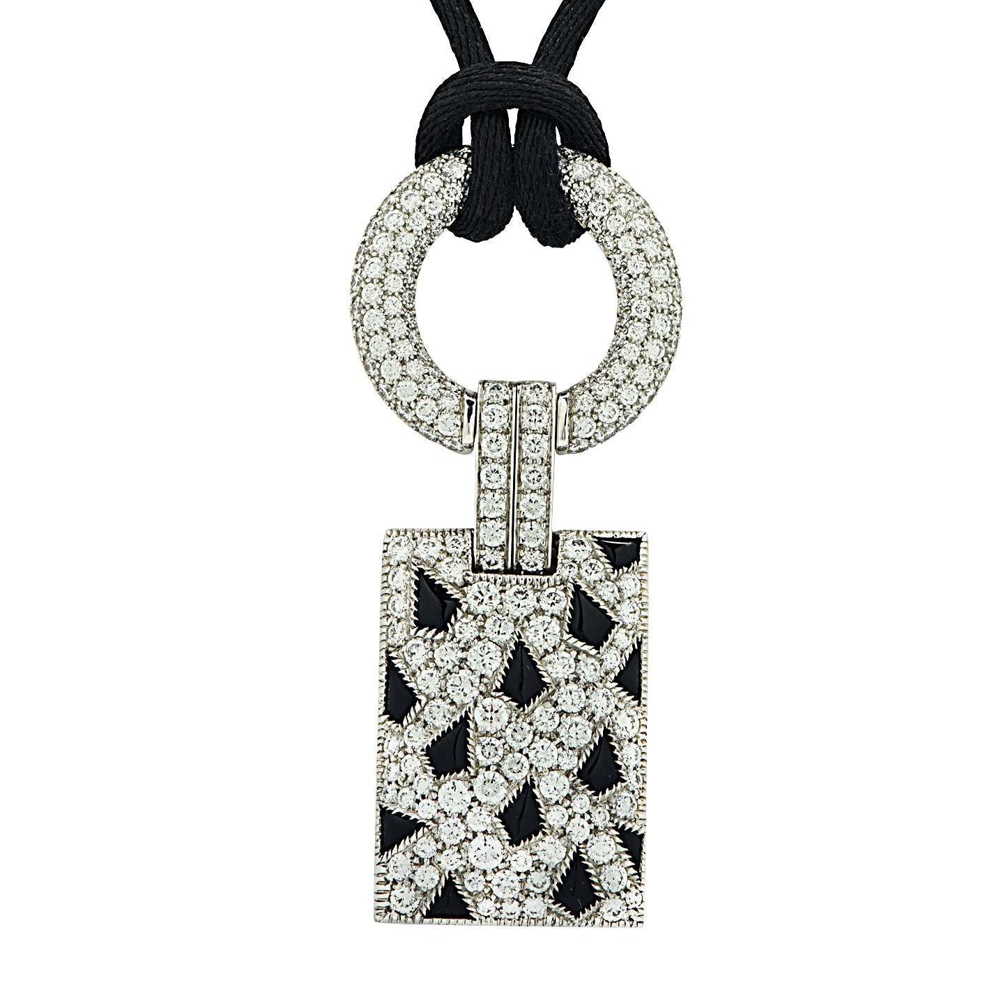 Panthère De Cartier 2.8 Carat Diamond and Black Onyx Pendant in 18K White Gold by Vivid Diamonds, showcasing exquisite sparkling diamonds and rich black onyx in a luxurious design.