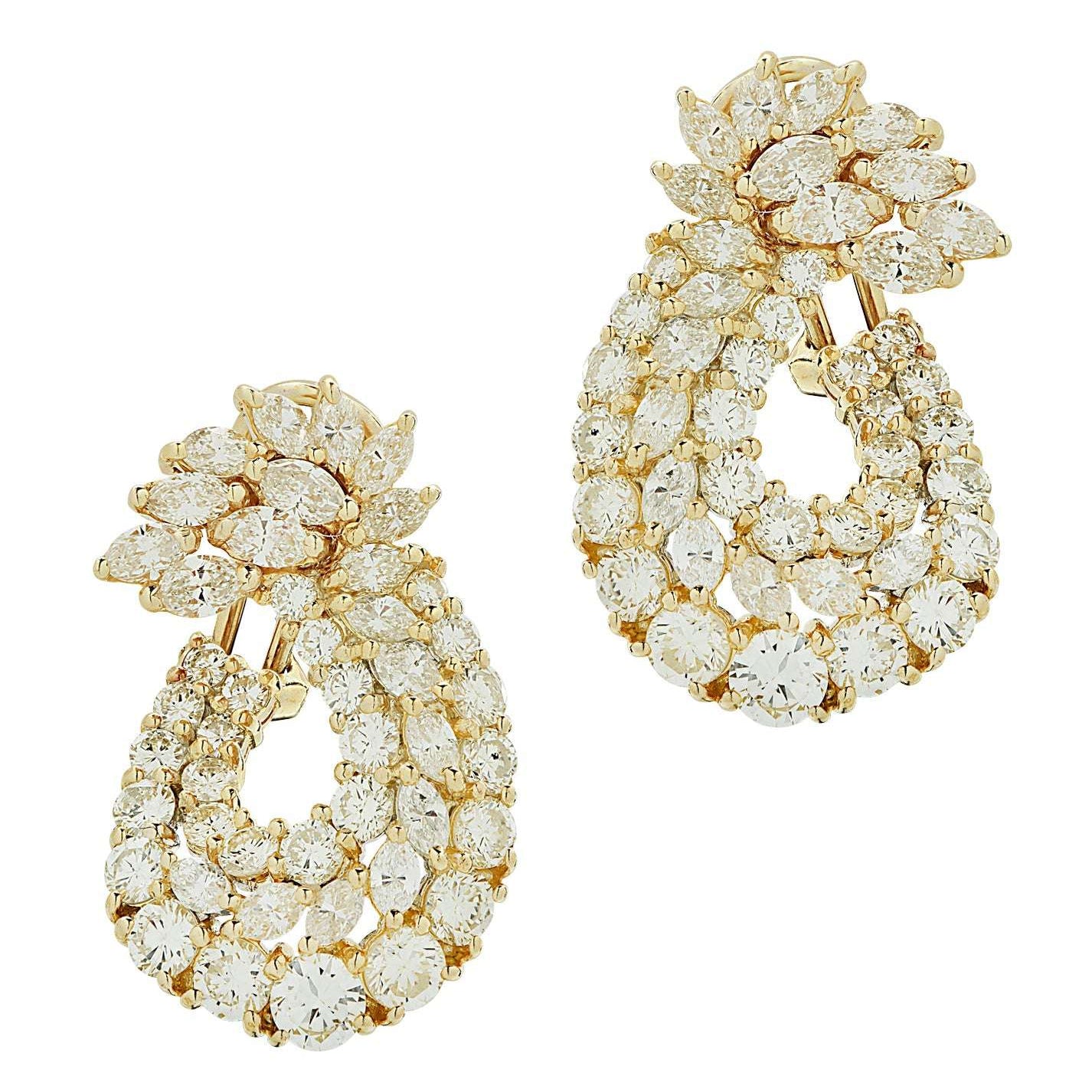Exquisite 8 Carat Diamond Swirl Hoop Earrings in 18K Yellow Gold by Vivid Diamonds, showcasing a luxurious design with round brilliant and marquise cut diamonds arranged in a captivating swirl pattern.