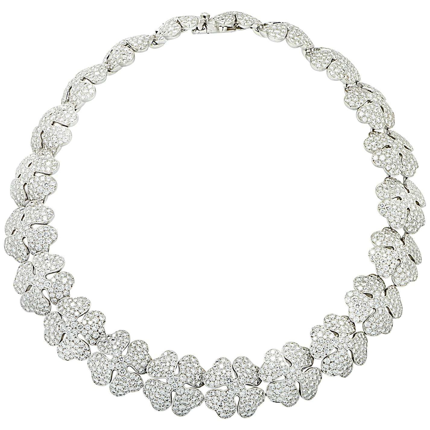 Exquisite Cartier Pave Diamond Clover Necklace from Vivid Diamonds, featuring an elegant design with shimmering clover motifs set in 18-karat white gold, adorned with 1,681 round brilliant-cut diamonds totaling approximately 54.32 carats.