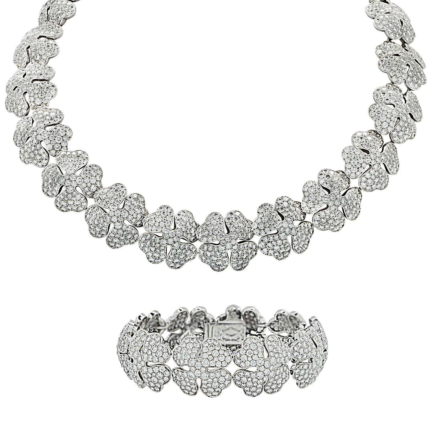 Exquisite Cartier Pave Diamond Clover Necklace and Diamond Suite by Vivid Diamonds, showcasing a stunning arrangement of diamond-studded clover motifs in 18k white gold.