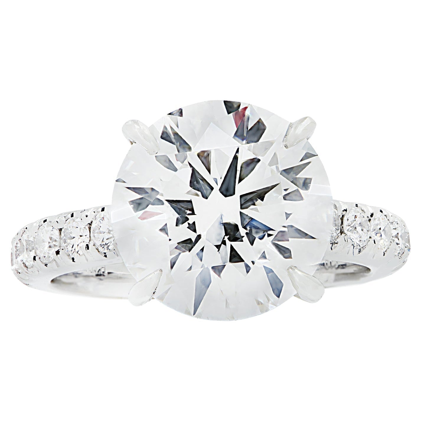 Elegant view of the Vivid Diamonds GIA Certified 4.63 Carat Round Brilliant Diamond Engagement Ring in Platinum, featuring a brilliant center stone and intricately crafted accents.