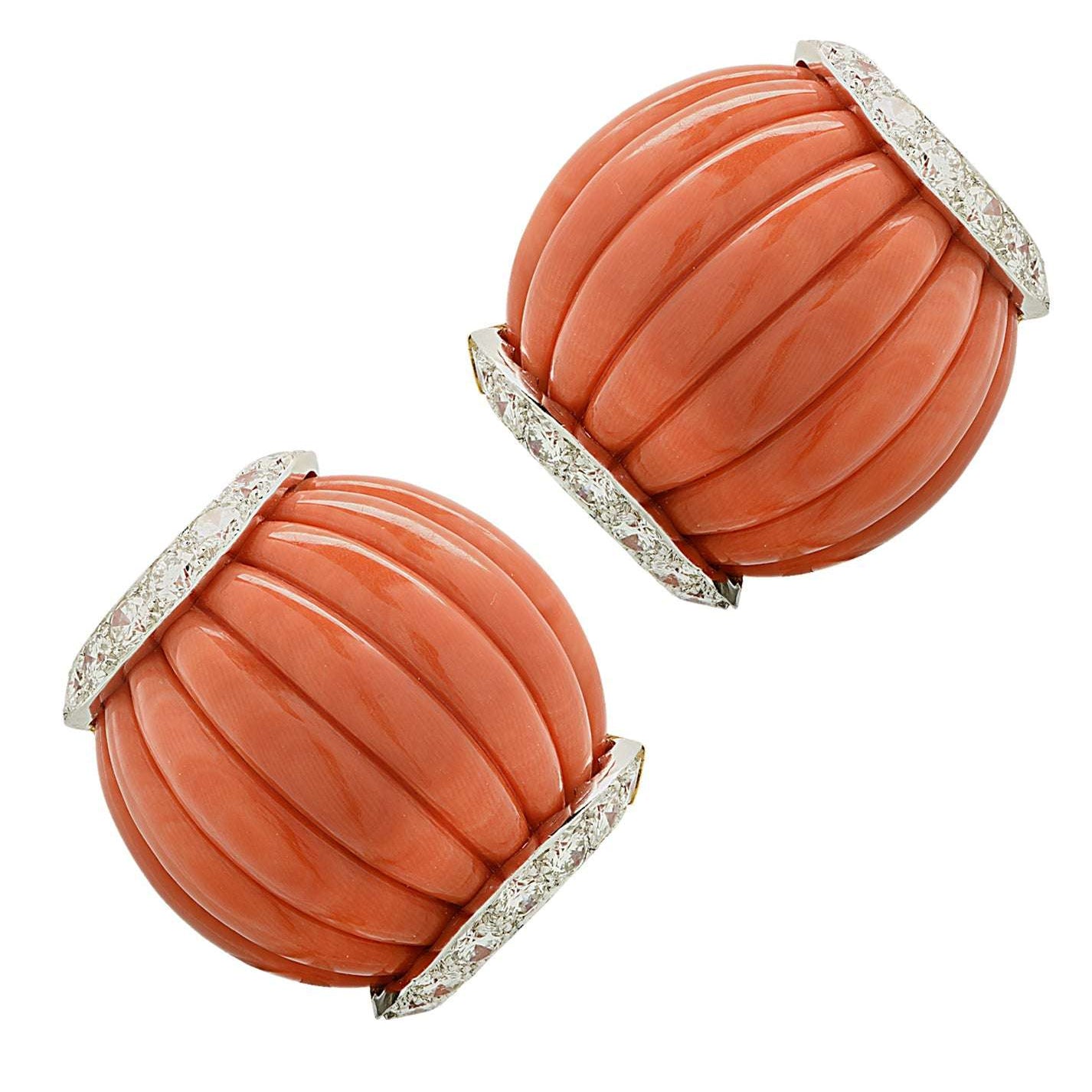 David Webb Fluted Coral & Diamond Earrings showcasing elegant fluted coral surrounded by sparkling diamonds, made from platinum and 18K gold, curated by Vivid Diamonds for a sophisticated look.