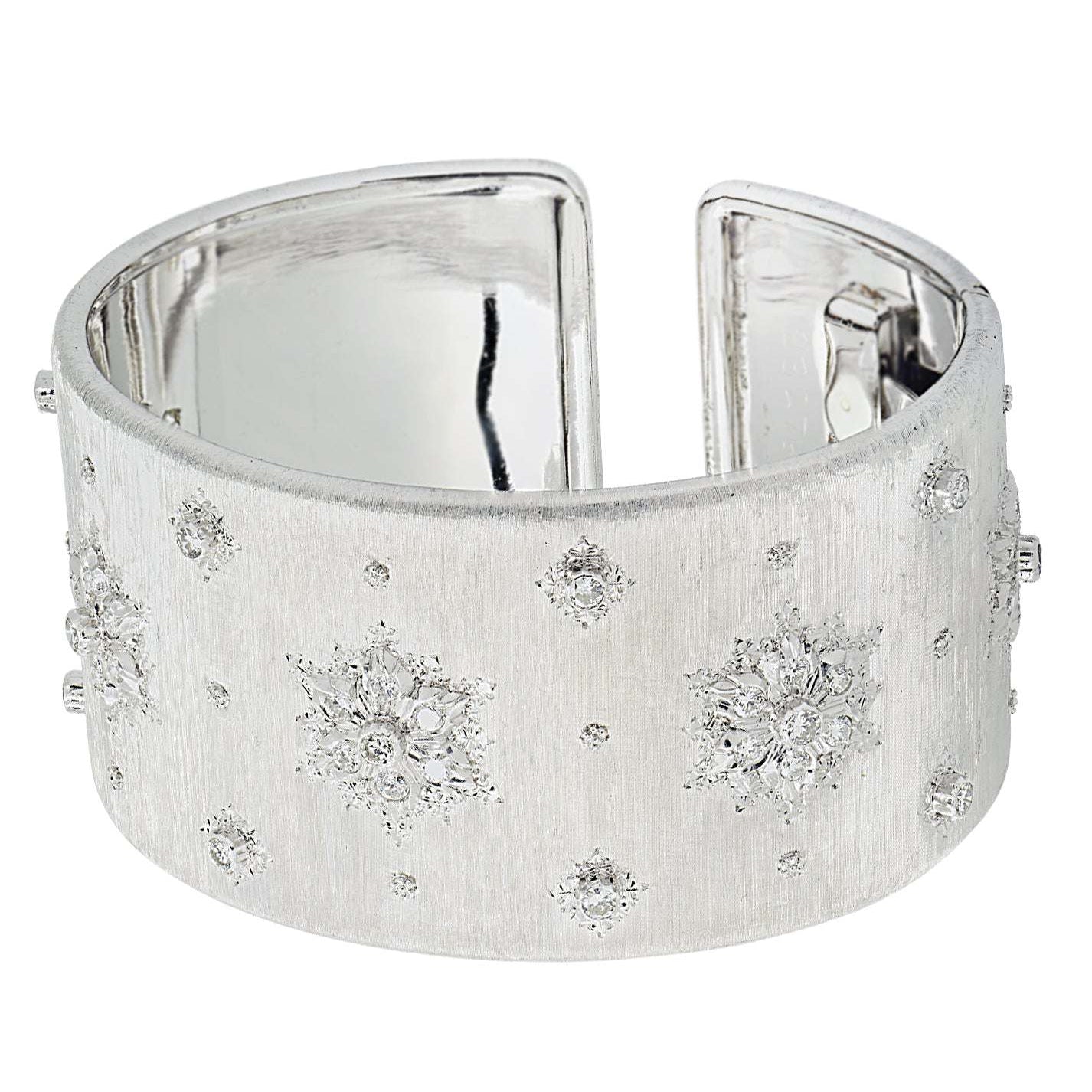 Sophisticated Buccellati Italy 18K White Gold Diamond Wide Cuff Bangle with a polished interior and detailed diamond accents, brought to you by Vivid Diamonds.