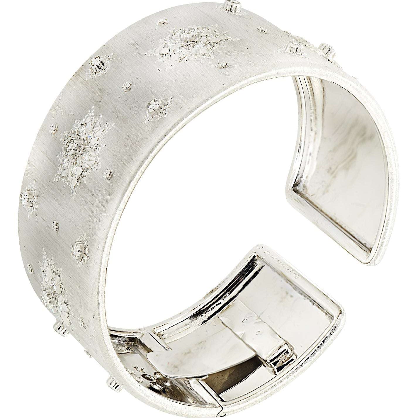 Elegant Buccellati Italy 18K White Gold Diamond Wide Cuff Bangle featuring a sleek design with sparkling diamonds, handcrafted by Vivid Diamonds.