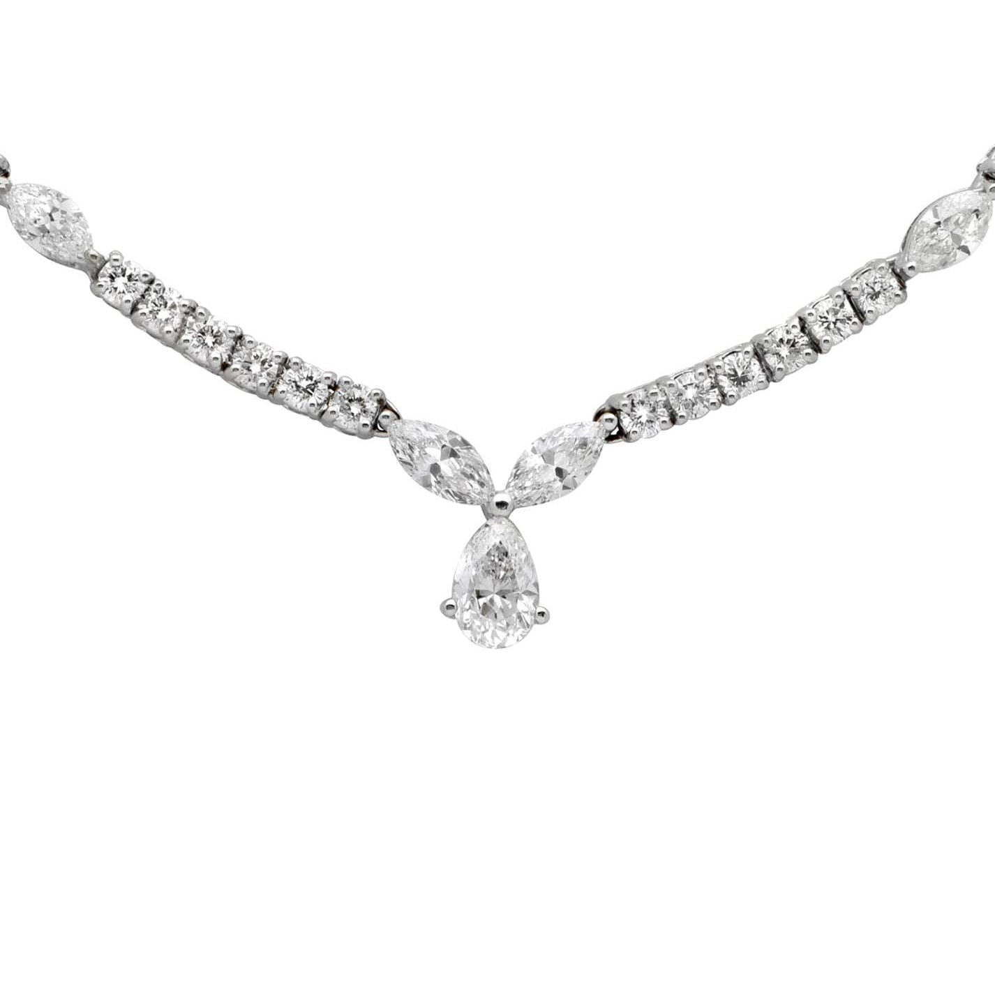 Stunning 7.51 Ct Diamond Pear Drop Necklace by Vivid Diamonds featuring a pear-shaped diamond drop and a dazzling arrangement of marquise and round cut diamonds set in 18K white gold.