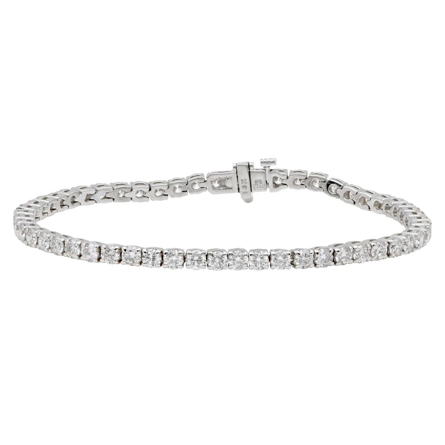 Exquisite 14K White Gold Diamond Bracelet with 51 Stones, 6.15 Carats by Vivid Diamonds, showcasing luxurious craftsmanship and sparkling brilliance.