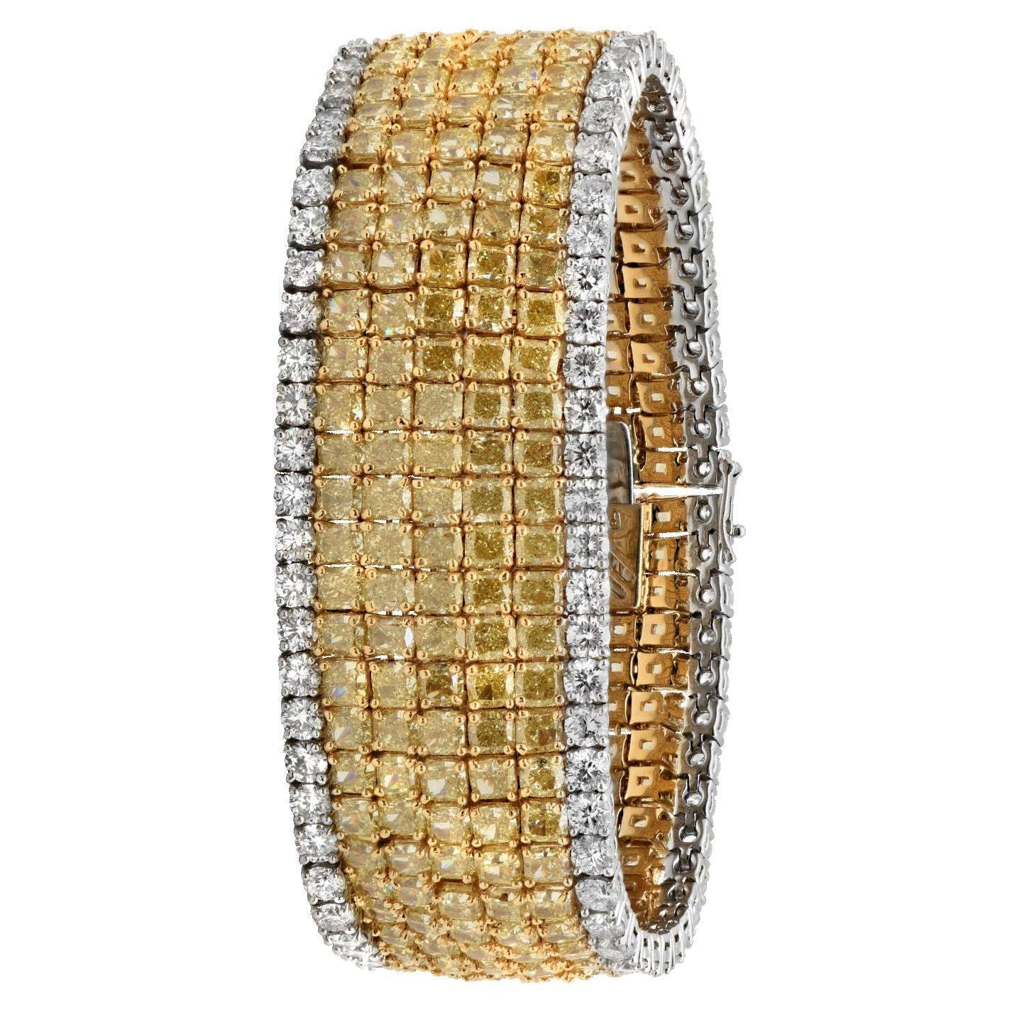 Elegant view of the Luxury 18K Yellow Gold & Platinum Diamond Bracelet from Vivid Diamonds, showcasing the intricate setting of 79Cts radiant and round cut fancy yellow and white diamonds.