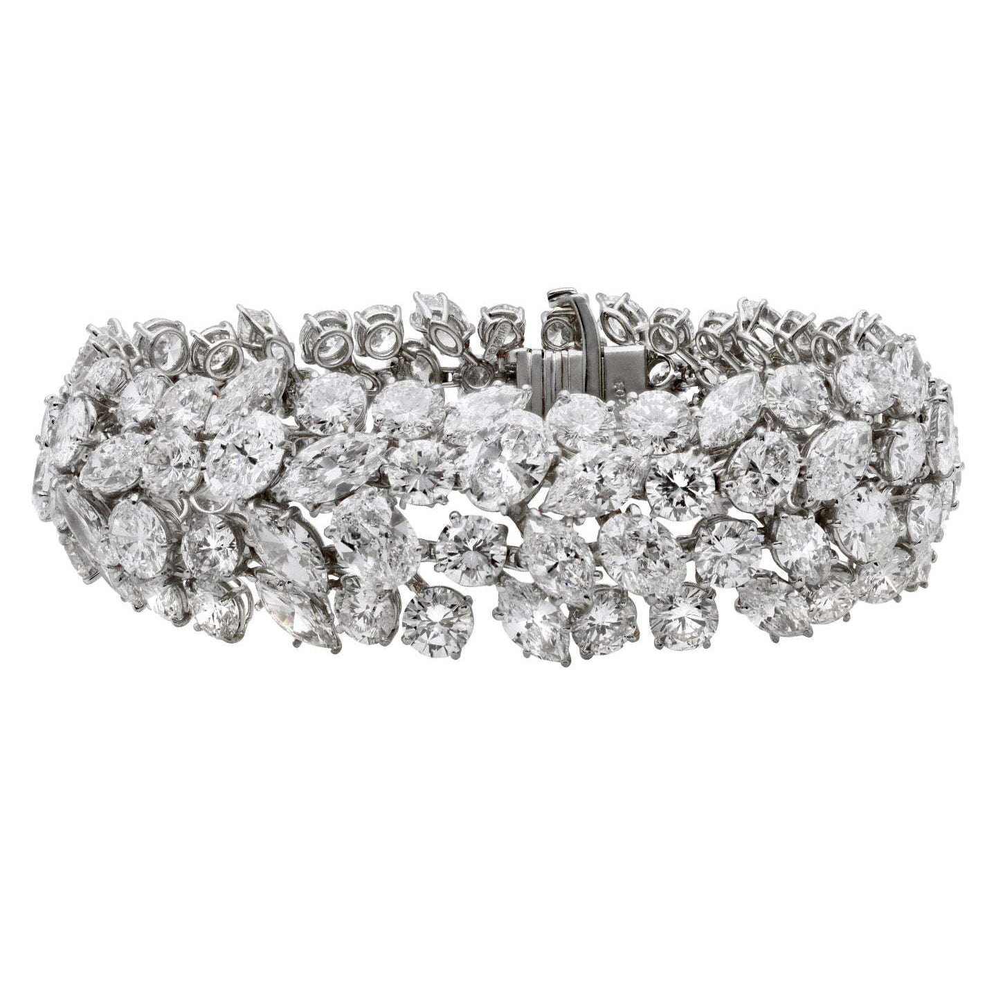Stunning Harry Winston Platinum Diamond Bracelet adorned with 63.54 Ct of Marquis & Round Brilliant Diamonds, embodying elegance and sophistication from Vivid Diamonds.