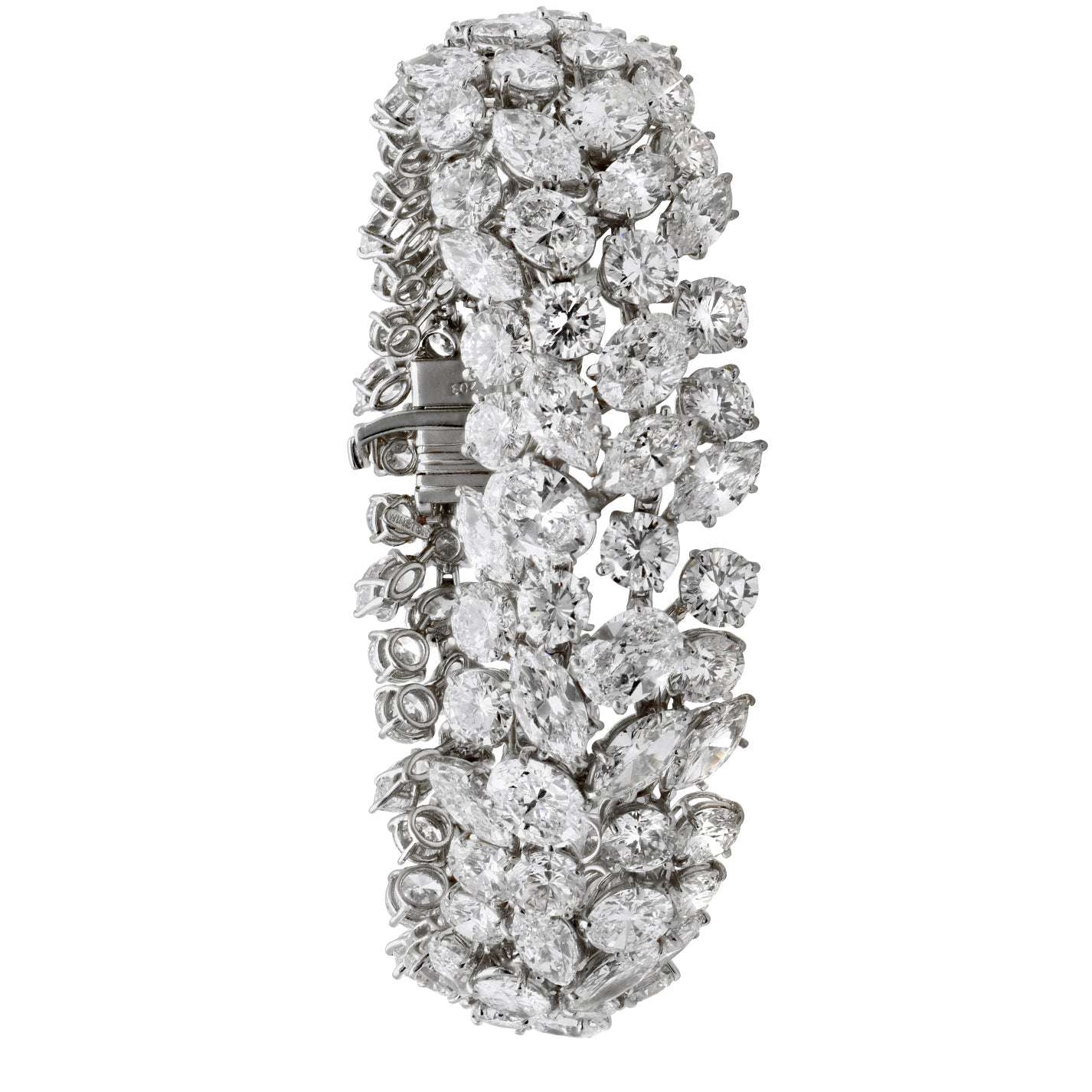 Luxury Harry Winston Platinum Diamond Bracelet featuring 63.54 Ct of marquis and round brilliant diamonds, showcasing a stunning floral design by Vivid Diamonds.