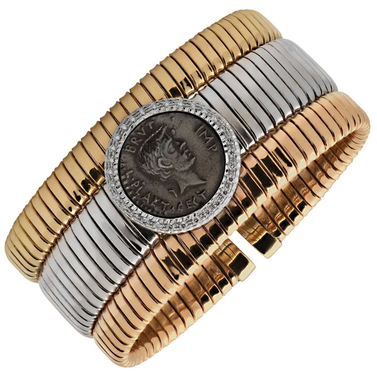 Tessitore 18K Tri-Color Gold Coin Bracelet with Diamonds – Italian Tubogas Elegance by Vivid Diamonds, showcasing a stunning blend of yellow, white, and rose gold with a Roman coin centerpiece surrounded by brilliant-cut diamonds.