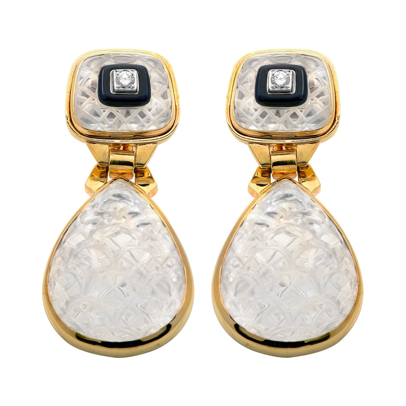 Close-up of David Webb 18K Yellow Gold & Platinum Rock Crystal Dangle Earrings with Diamonds - V48549 featuring intricate detailing and luxurious materials, designed by Vivid Diamonds.