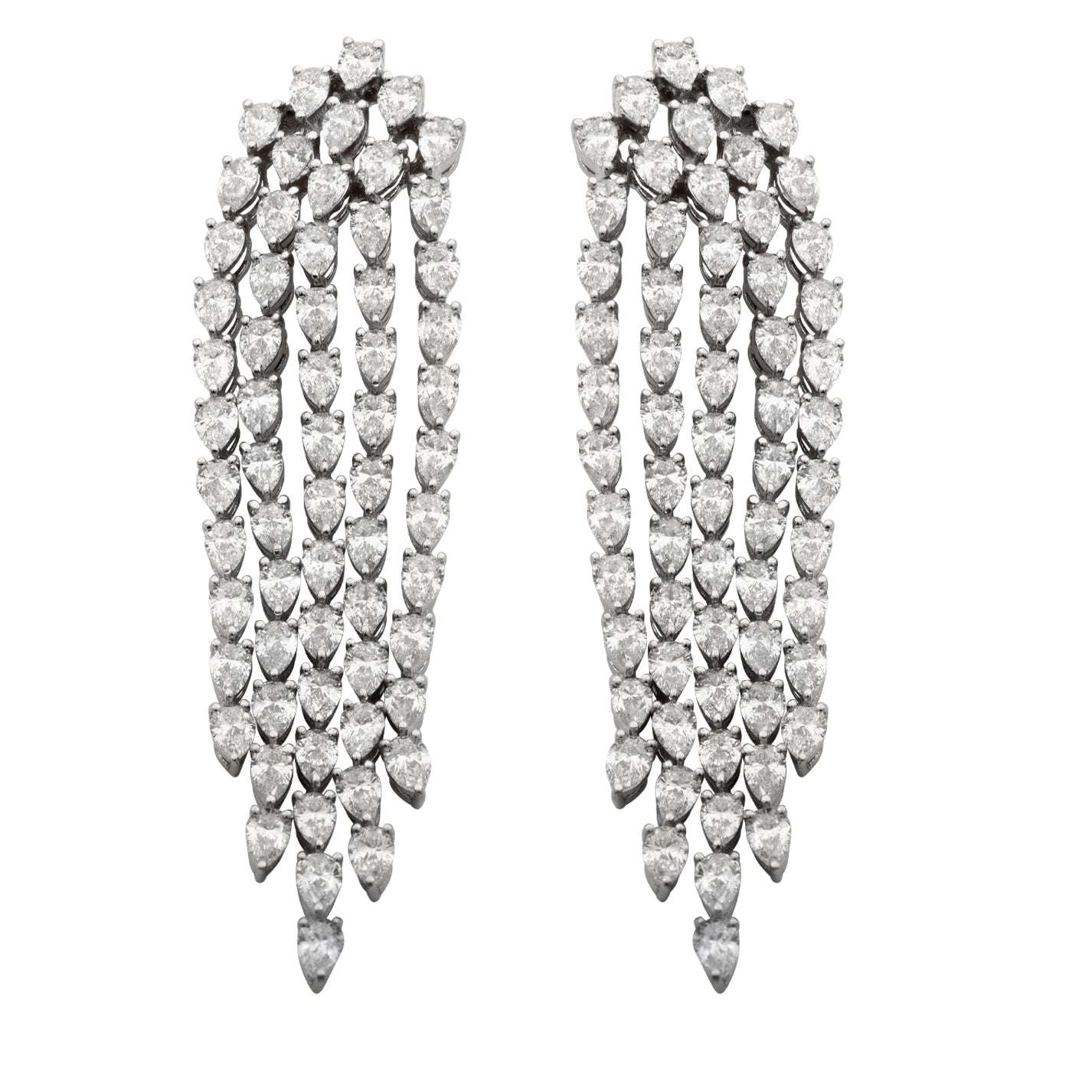 Elegant 18K White Gold Diamond Dangle Earrings with 6.00 Carats Pear-Shaped Diamonds by Vivid Diamonds, highlighting intricate craftsmanship and dazzling pear-shaped diamonds in a sophisticated arrangement.