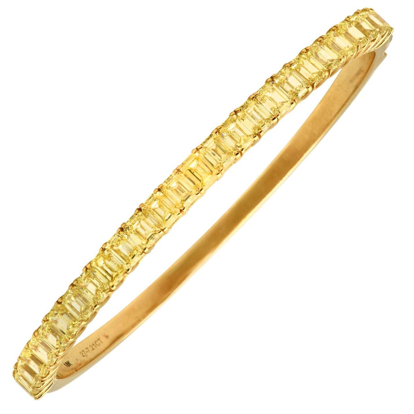Exquisite 18K Yellow Gold Fancy Yellow Diamond Bracelet featuring 27 emerald-cut fancy yellow diamonds, crafted by Vivid Diamonds, showcasing 7.21 carats of elegance.