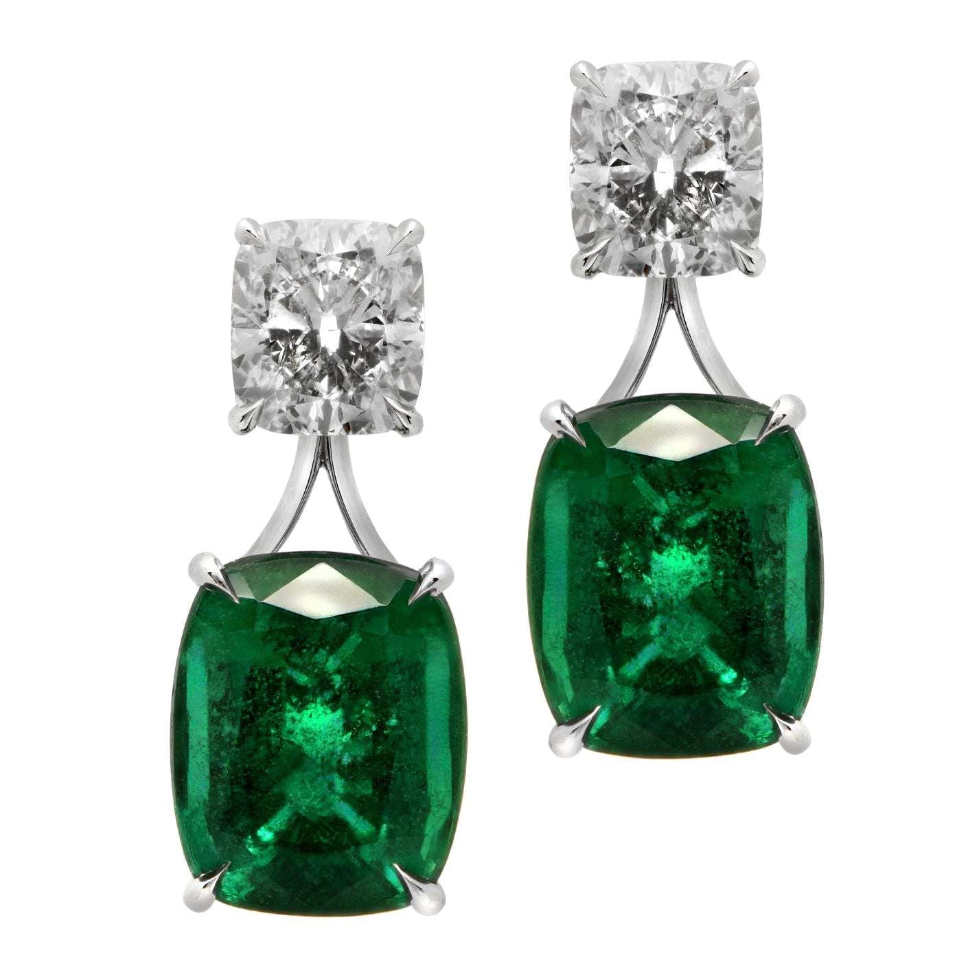 Luxurious 18K white gold dangle earrings featuring vibrant emeralds and brilliant cushion-cut diamonds by Vivid Diamonds, total weight 11.93ct.