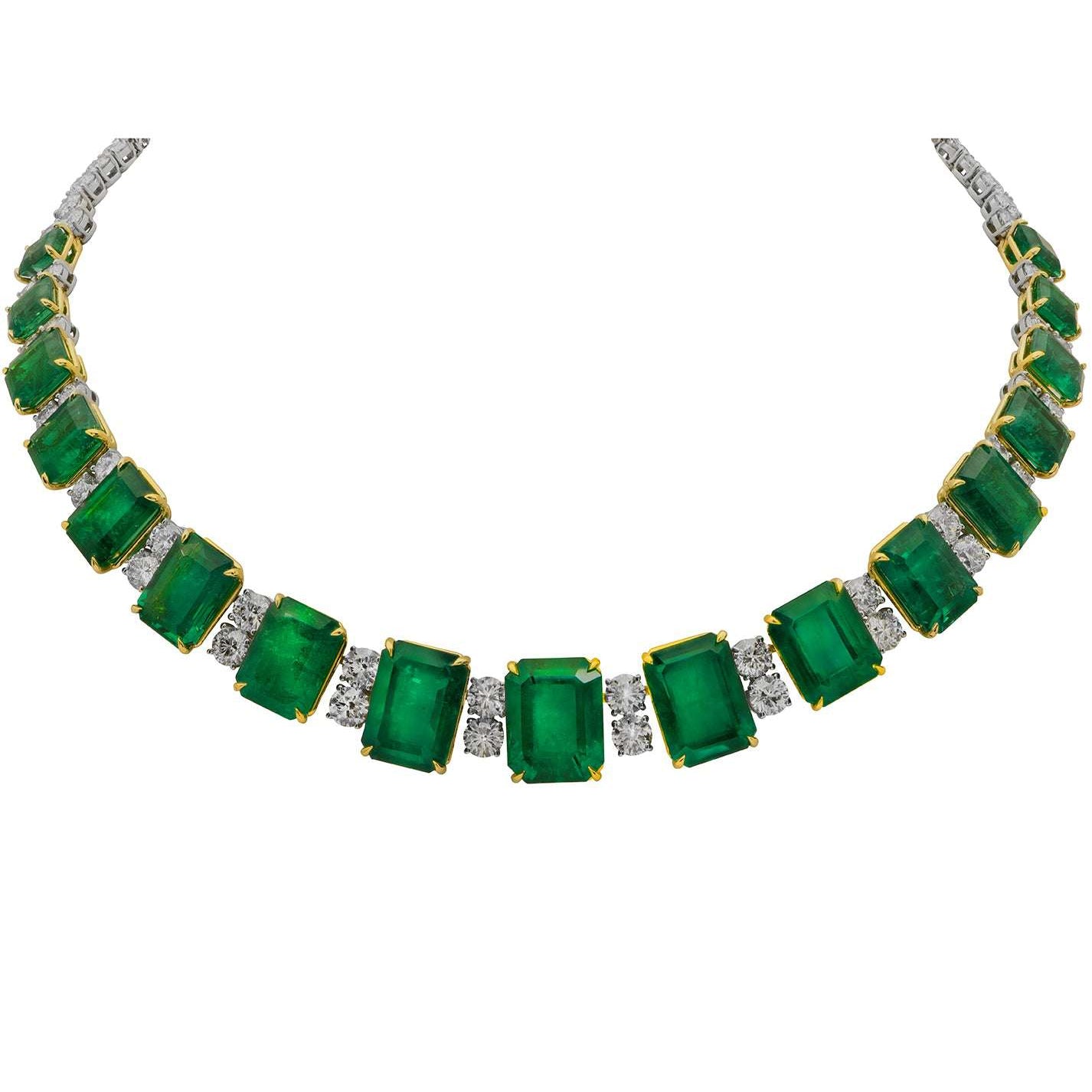 A stunning 103.32 Carat Emerald and Diamond Necklace in Platinum by Vivid Diamonds, featuring a sequence of emerald-cut emeralds and brilliant diamonds, showcasing a luxurious and timeless design.
