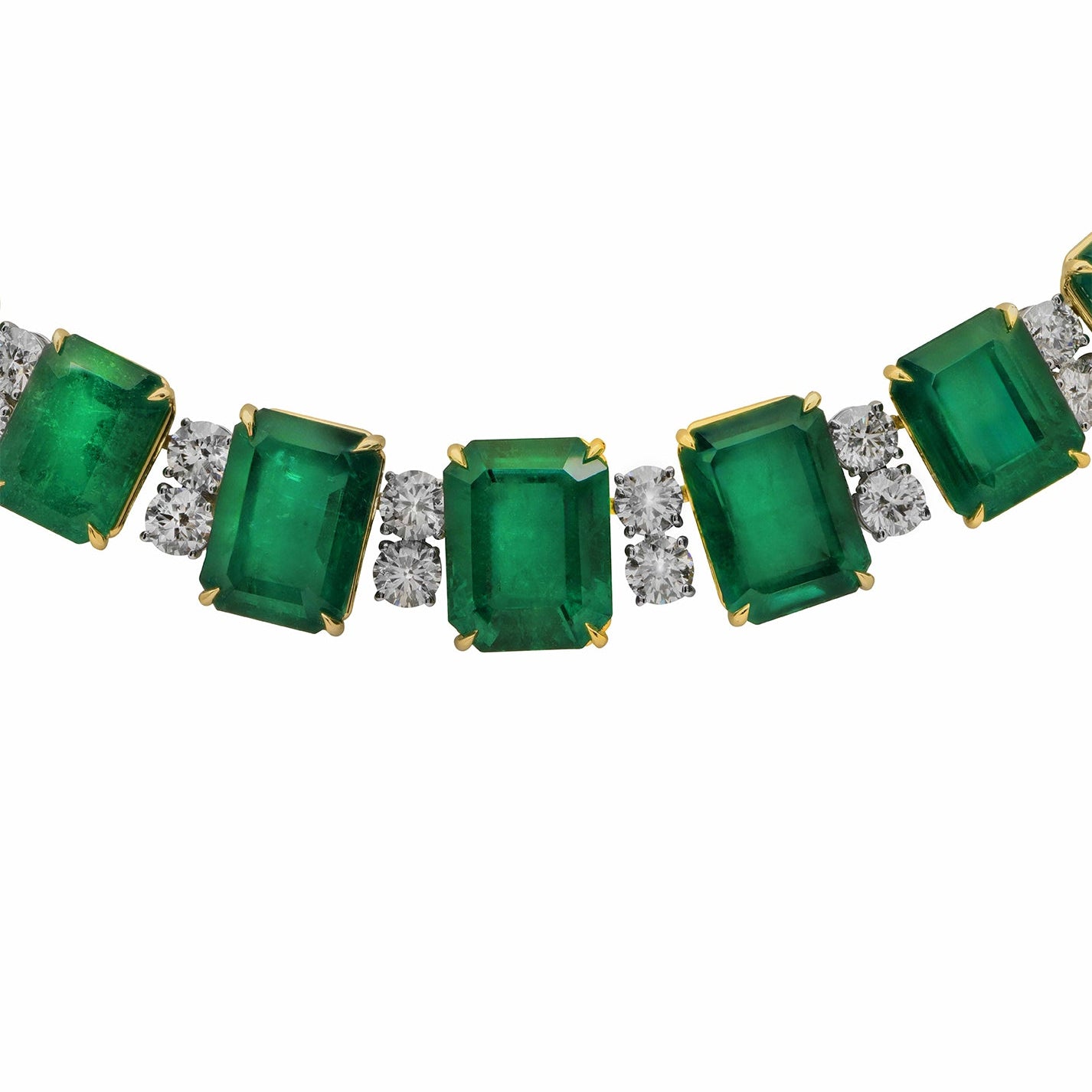 Close-up of the exquisite 103.32 Carat Emerald and Diamond Necklace in Platinum by Vivid Diamonds, highlighting the rich emerald-cut emeralds paired with brilliant diamonds.