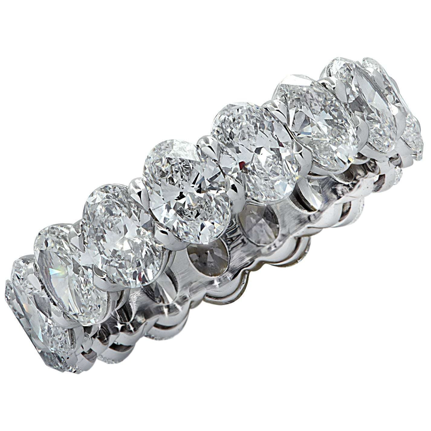 Elegant 5.32 Carat Oval Cut Diamond Eternity Band in Platinum by Vivid Diamonds, showcasing a stunning array of oval diamonds in a luxurious setting.