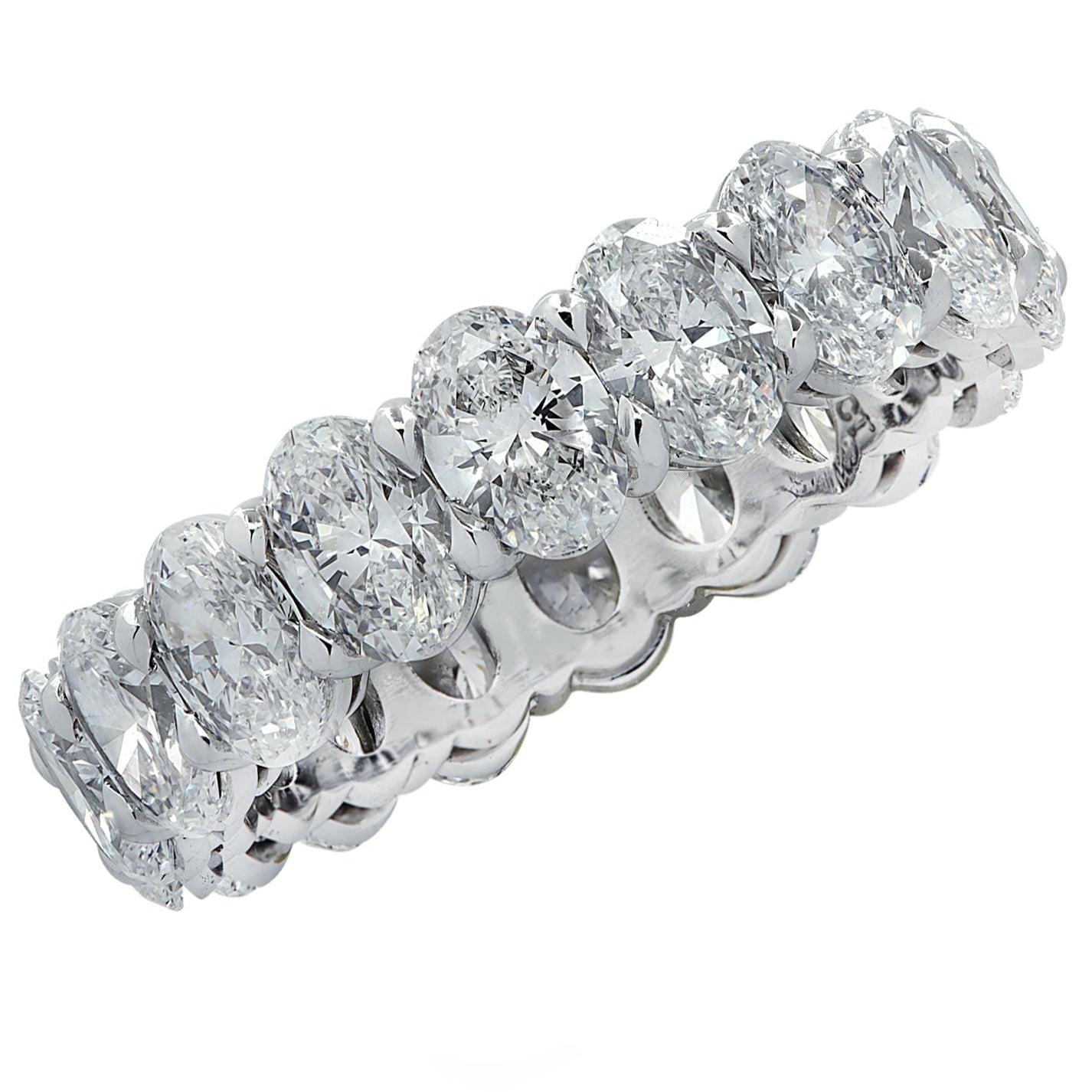 Vivid Diamonds 4.31 Carat Platinum Eternity Band featuring 18 oval cut diamonds, showcasing elegant sparkle and luxury craftsmanship, size 5.75.