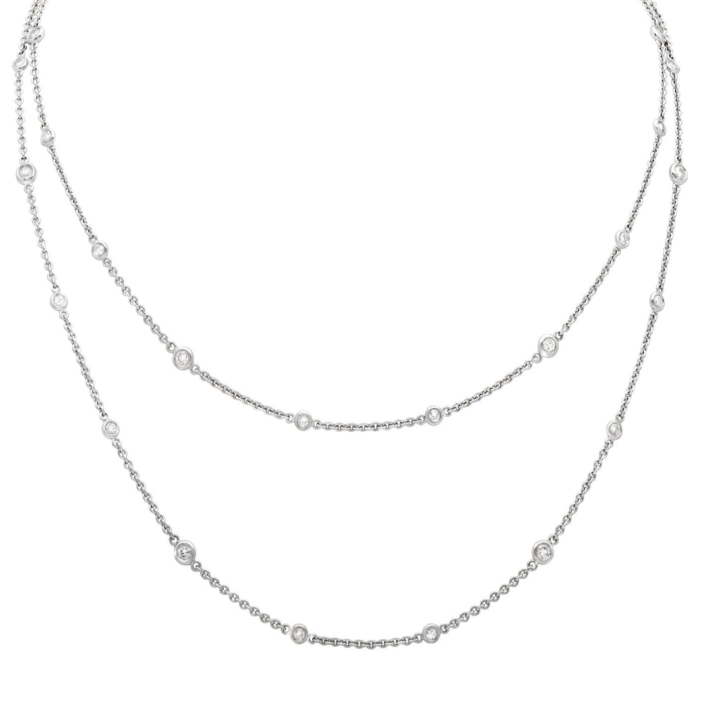 Close-up view of the Elegant 18K White Gold Diamond Necklace with 2.2ct Round Brilliant Diamonds by Vivid Diamonds, emphasizing the craftsmanship and sparkle of the round brilliant diamonds set in luxurious white gold.
