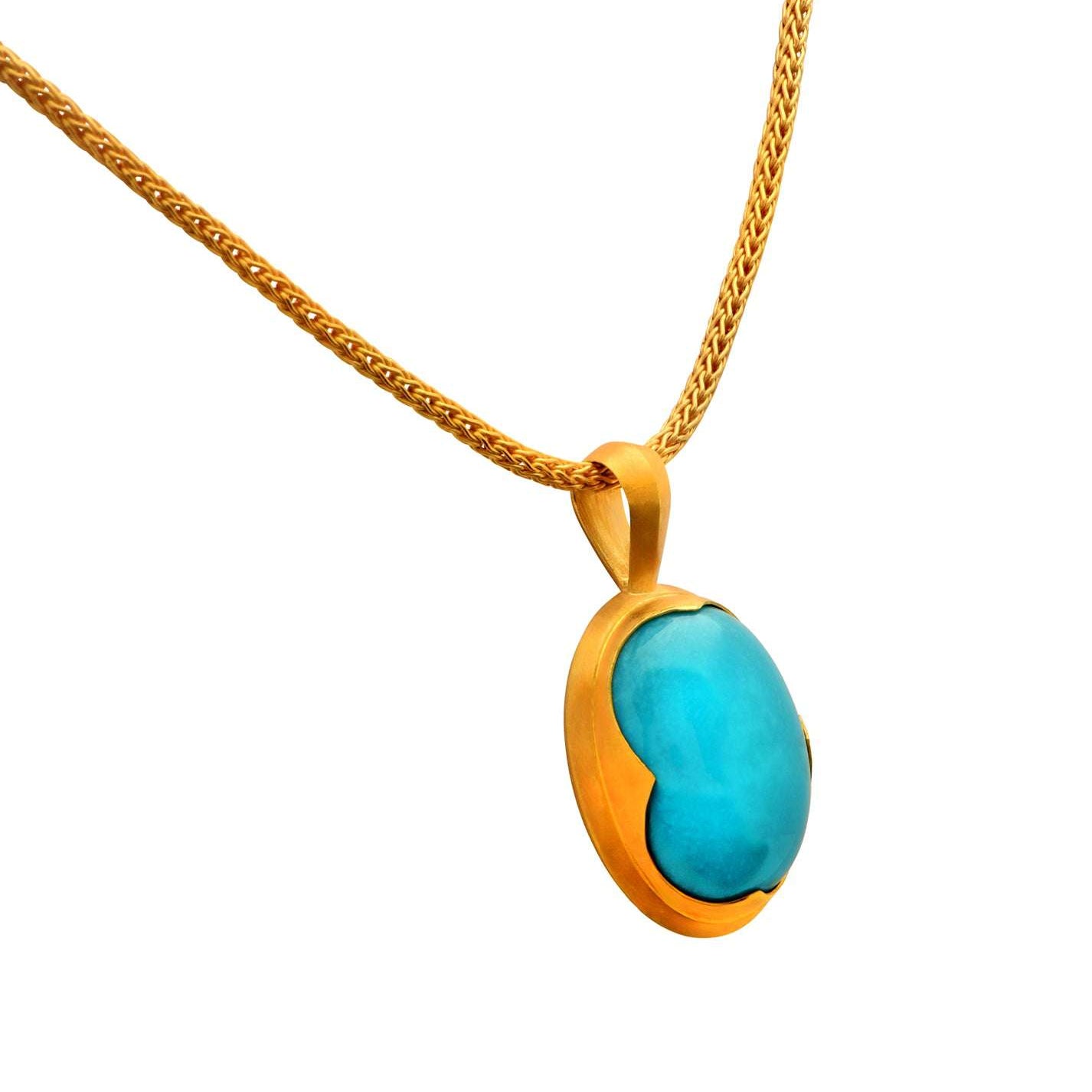 Elegant Sleeping Beauty Turquoise Necklace by Vivid Diamonds, featuring a radiant turquoise pendant set in luxurious 22k yellow gold.