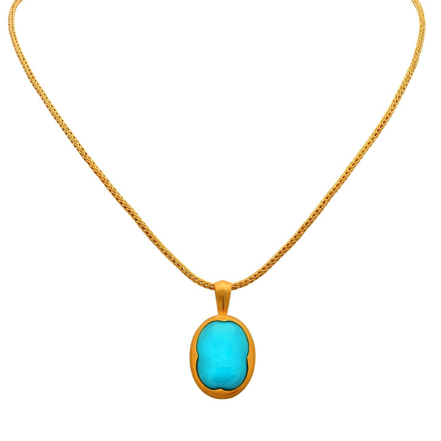 Luxurious Sleeping Beauty Turquoise Necklace by Vivid Diamonds, featuring a stunning turquoise gemstone pendant set in rich 22k yellow gold, embodying elegance and modern simplicity.