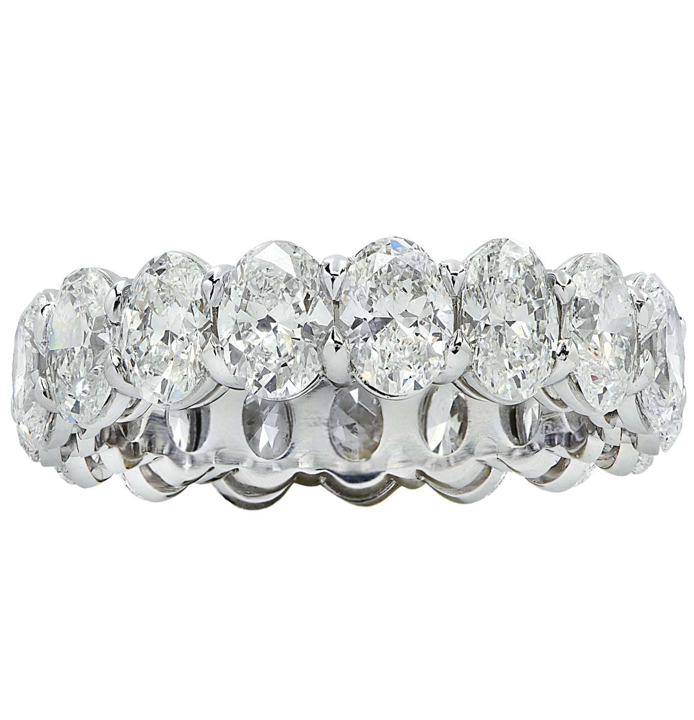 Vivid Diamonds GIA Certified 5.35 Carat Oval Diamond Eternity Band in Platinum showcasing a dazzling array of oval diamonds, reflecting brilliance and luxury.