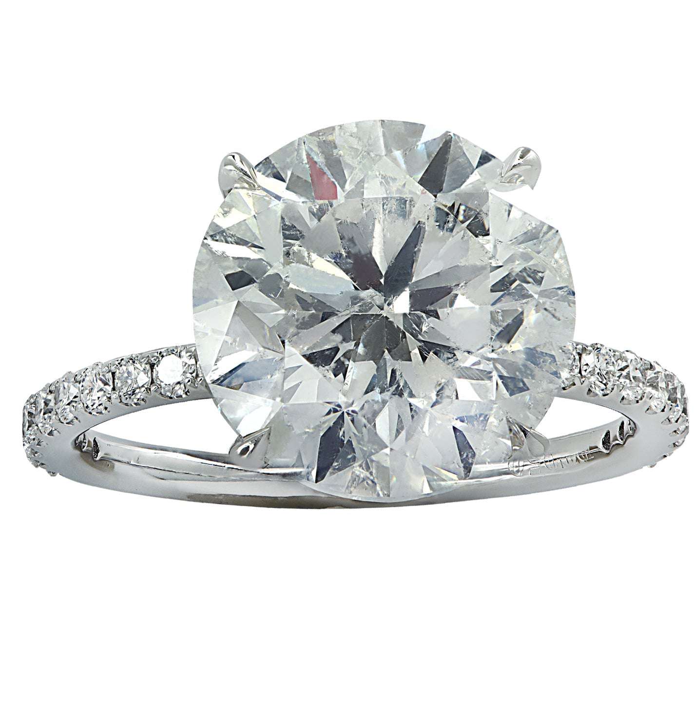 Exquisite Vivid Diamonds 6.20 Ct Platinum Engagement Ring showcasing a dazzling round brilliant cut diamond and shimmering accent diamonds, perfect for celebrating love and commitment.