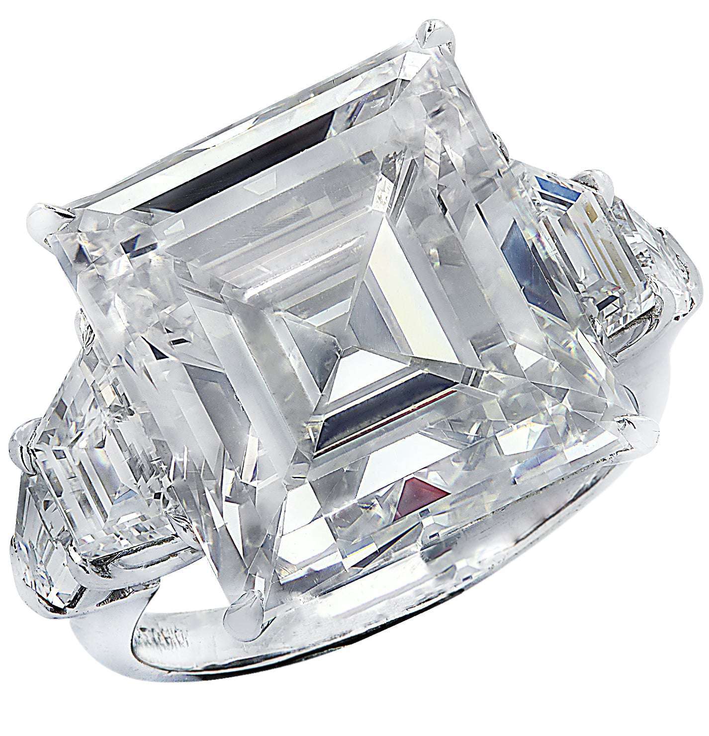 Exquisite 12.46ct Emerald Cut Diamond Engagement Ring in Platinum with Trapezoid Side Stones by Vivid Diamonds, showcasing a stunning emerald cut center stone surrounded by elegant trapezoid diamonds, crafted for the discerning bride.