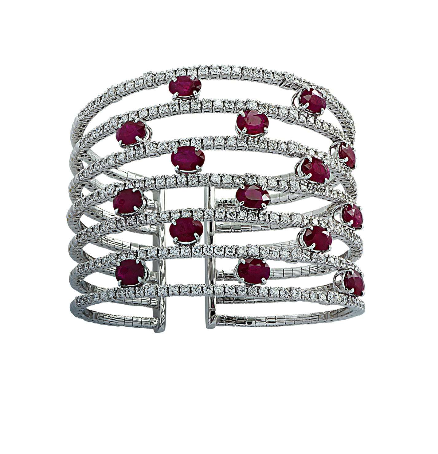 Stunning close-up of the Diamond & Ruby Cuff Bangle Bracelet by Vivid Diamonds, highlighting the interplay of rubies and diamonds intricately crafted in 18K white gold.