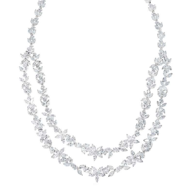 Elegant 40 Carat Vivid Diamonds Cluster Necklace in 18K White Gold by Vivid Diamonds, featuring a luxurious arrangement of radiant diamonds in oval and marquise shapes.