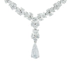 Stunning Vivid Diamonds 56 Carat Platinum Diamond Drop Necklace featuring a dazzling pear-shaped diamond centerpiece and intricate diamond arrangement, epitomizing luxury.
