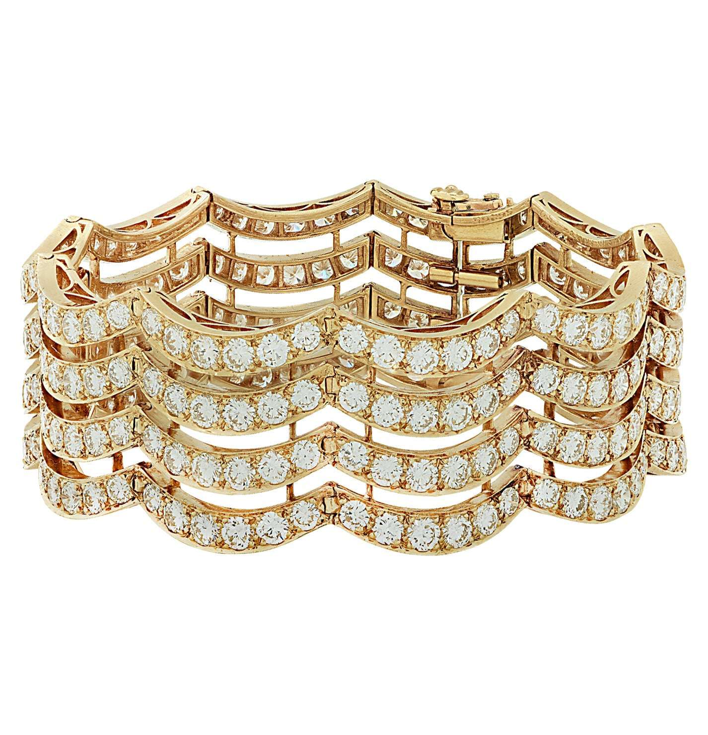 Exquisite Vintage 1970s Van Cleef & Arpels 26 Carat Diamond Bracelet in 18K Yellow Gold by Vivid Diamonds featuring a luxurious wave design embellished with diamonds.