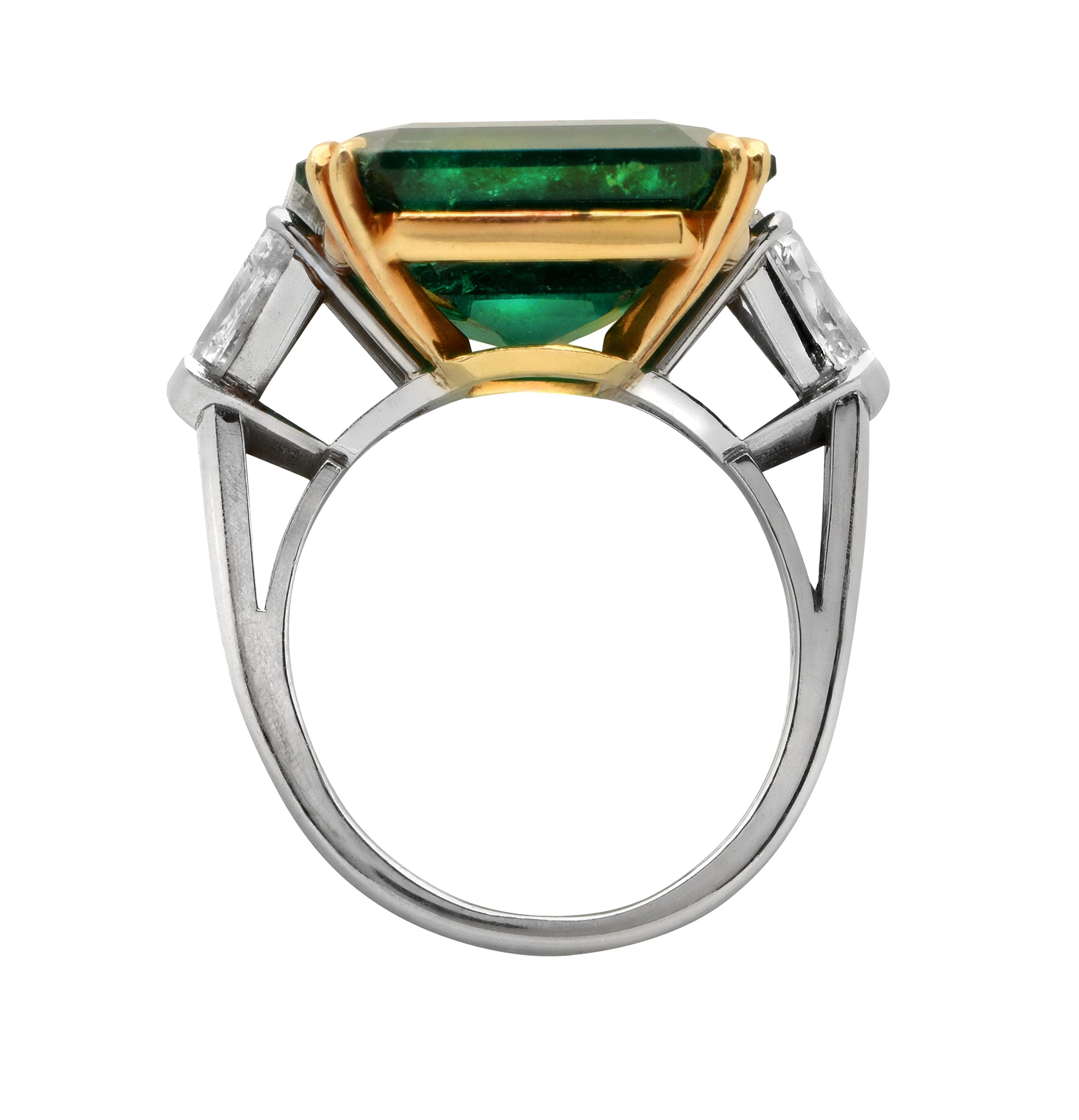 Luxury 15.48 Carat Emerald-Cut Emerald and Diamond Platinum Ring by Vivid Diamonds showcasing a vibrant emerald centerpiece, flanked by tapered baguette-cut diamonds, crafted in refined platinum with 18k yellow gold prongs.