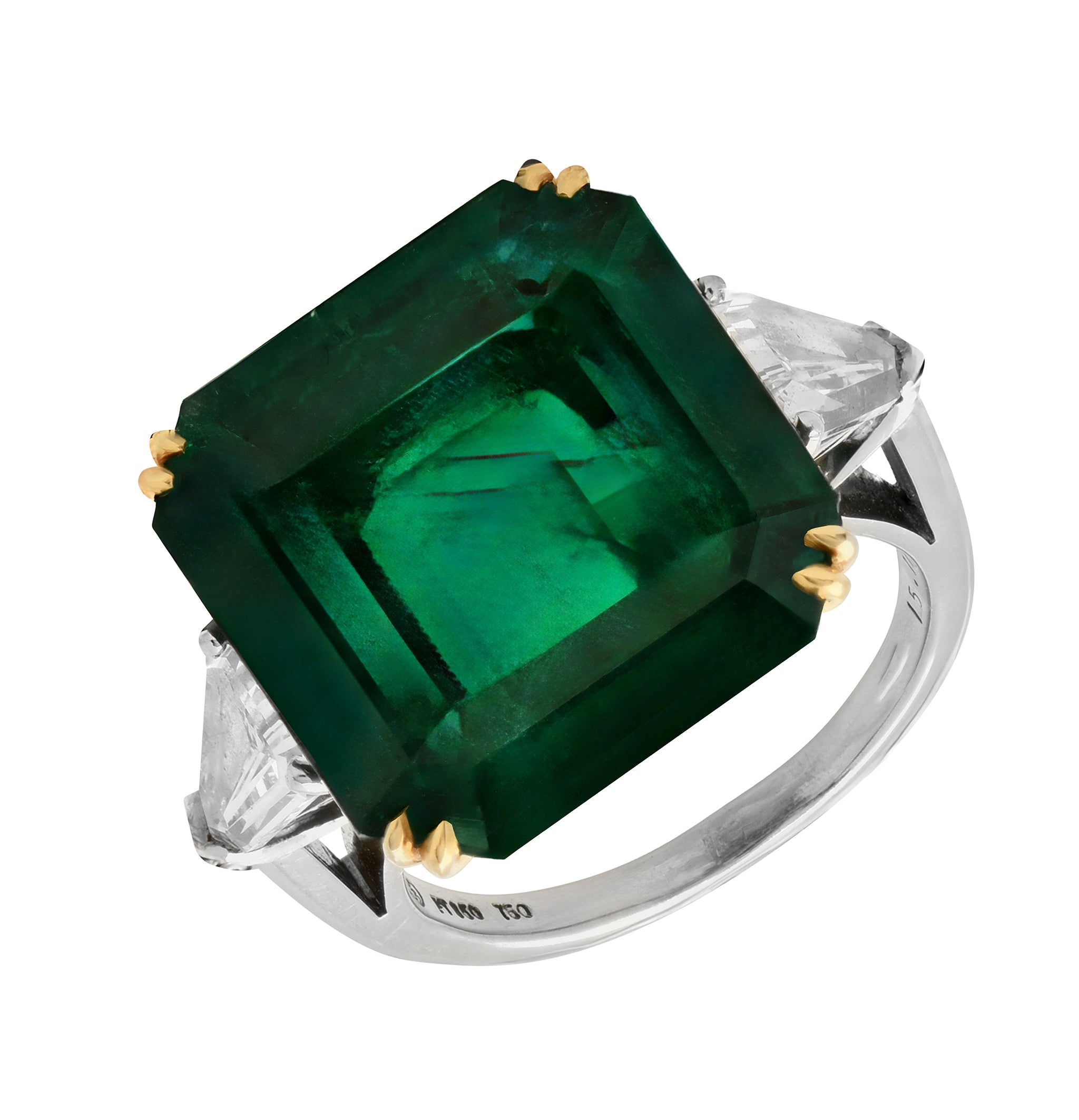 Exquisite luxury 15.48 Carat Emerald-Cut Emerald and Diamond Platinum Ring by Vivid Diamonds featuring a stunning green emerald centerpiece with tapered baguette-cut diamonds, showcasing opulence and exceptional craftsmanship.