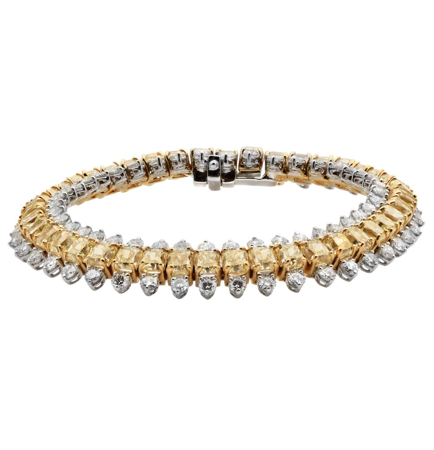 Close-up of the VIVID Color Diamond Bracelet by Vivid Diamonds featuring a stunning dual-tone design with radiant-cut yellow diamonds and round brilliant white diamonds, highlighted by a secure clasp.