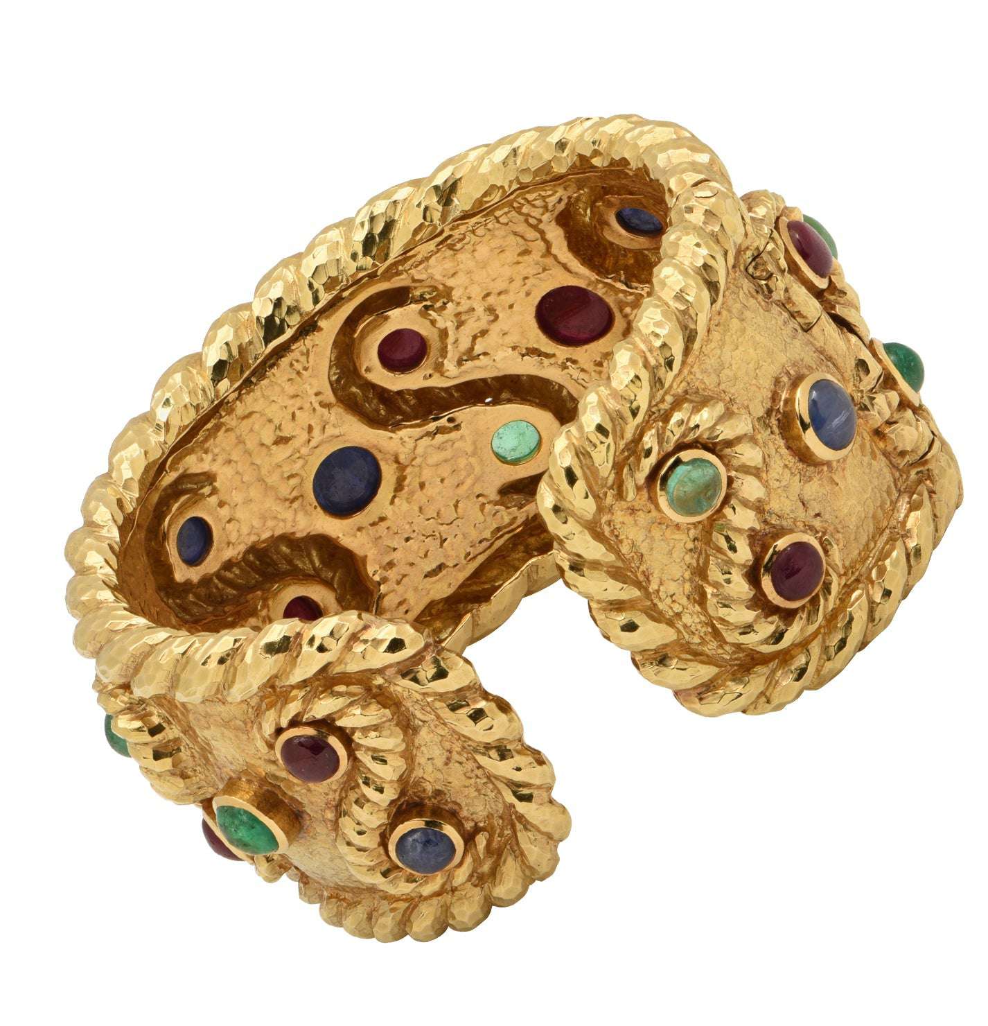 David Webb 18K Yellow Gold Cuff Bangle Bracelet featuring 6 Emeralds, 8 Rubies and 6 Sapphires, crafted by Vivid Diamonds, showcasing a unique hammered texture and vibrant cabochon gemstones.