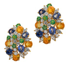 Close-up view of exquisite mixed gemstone earrings by Vivid Diamonds, featuring a luxurious combination of yellow sapphires, green gemstones, and diamonds, embodying timeless elegance.