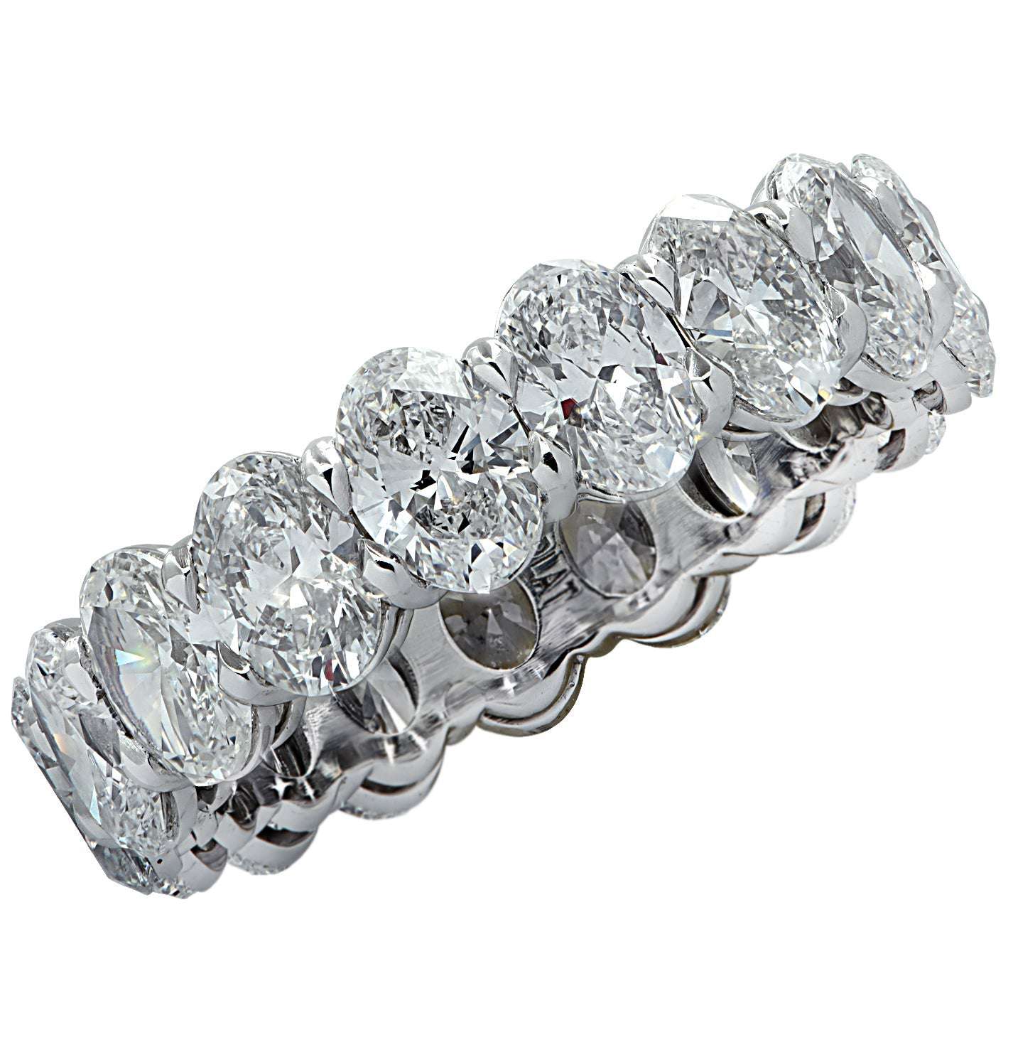 Elegant 5.32 Carat Oval Cut Diamond Eternity Band in Platinum by Vivid Diamonds, showcasing a stunning array of oval diamonds in a luxurious setting.