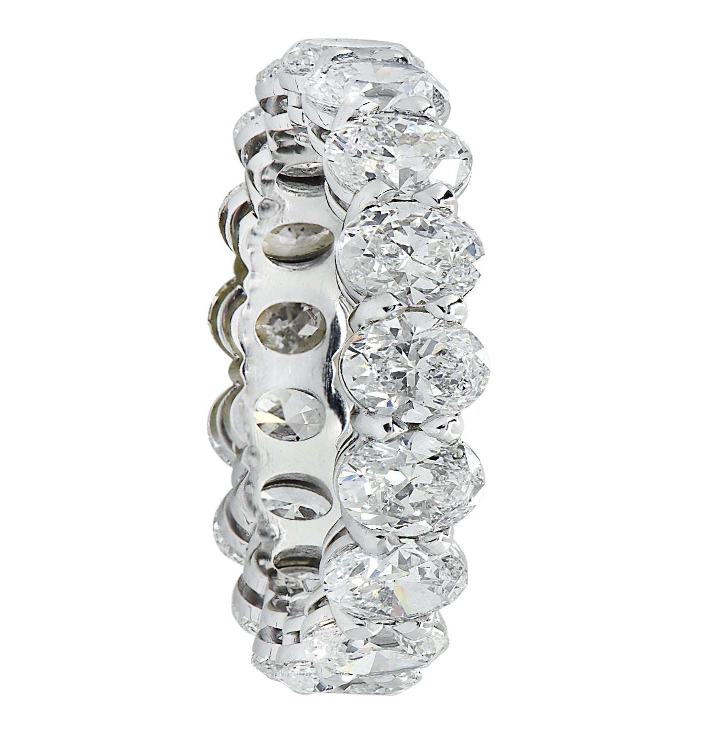 Side view of the Vivid Diamonds 5.10 CT Oval Eternity Band in Platinum, highlighting its stunning diamonds and luxurious design.