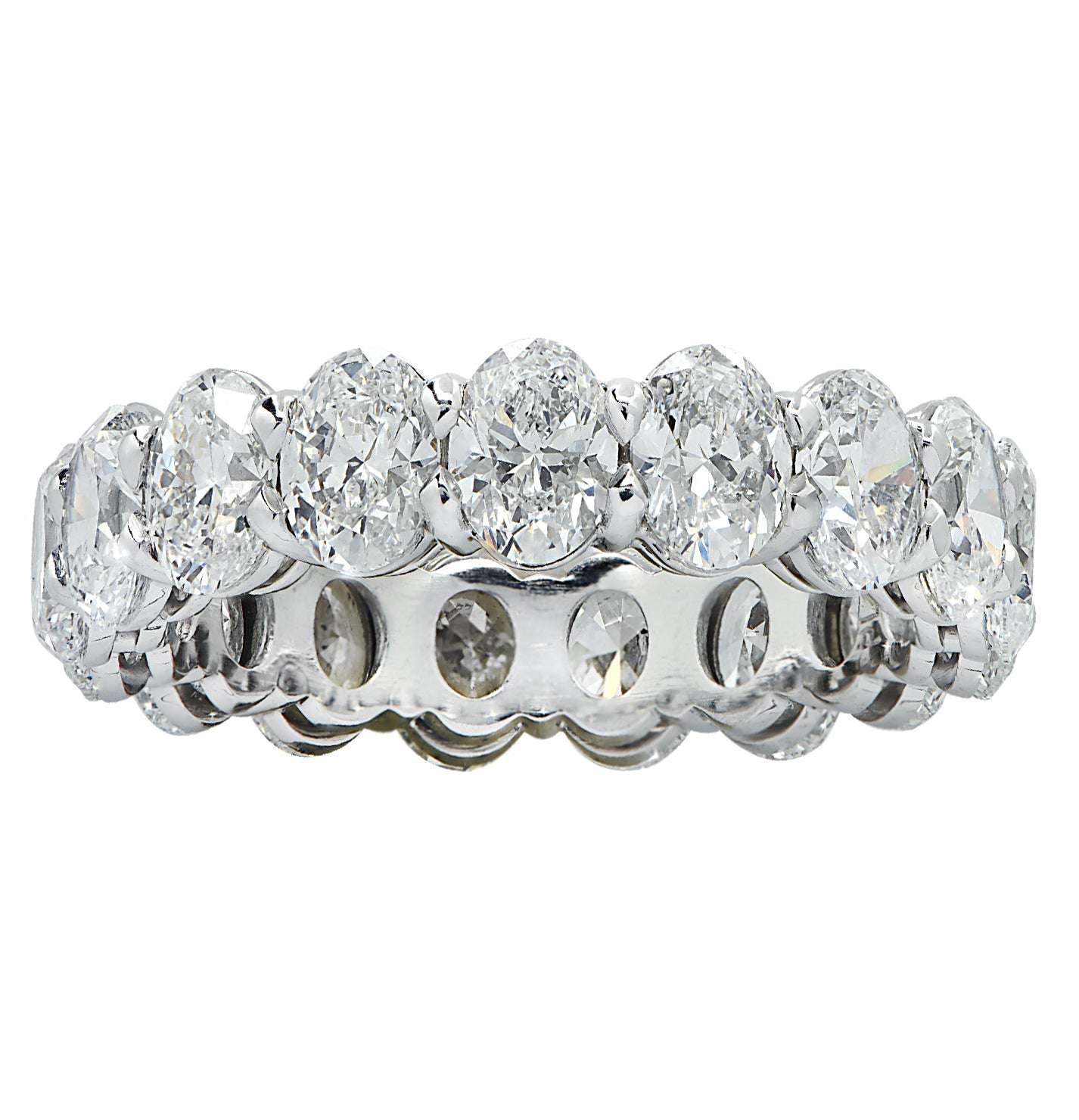 Exquisite Vivid Diamonds 4.39 Ct Platinum Diamond Eternity Band with 18 oval cut diamonds, highlighting its sophisticated and timeless design.